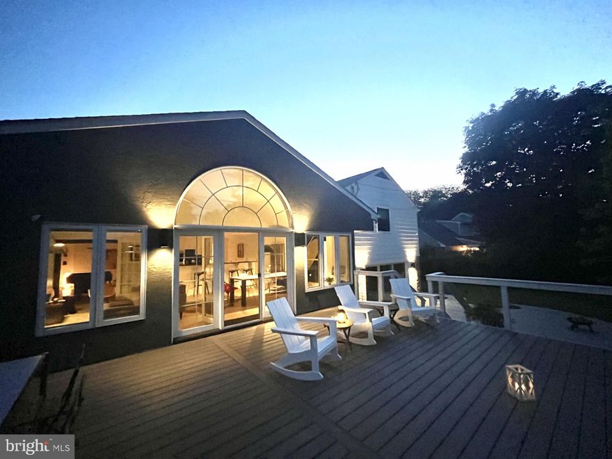 Welcome to this beautiful 5 Bedroom / 2 full and 2 half bath renovated home located in a walkable well established neighborhood in Villanova on a 0.7-acre lot. Proximity to Villanova Septa commuter station is 0.8 miles, Black Rock middle school 0.7 miles, Stoneleigh Garden 0.4 miles and Freeway 476 access in 2.0 miles distance. This location provides convenience besides everything the Main Line has to offer. Approaching the property you will find a circular and a side driveway. The circular driveway will bring you to the main entrance of the property and the side driveway leads to a 2 car garage. The 2022 major renovation focused on functional and aesthetic improvements with the goal to create a contemporary home that is ready for years to come. Key improvements are new Marvin windows, Kitchen with all new stainless steel appliances, new quartz countertops and refinished cabinets. Fully renovated two bathrooms. New tile flooring on lower level, new HVAC system and paint and detailing throughout the property. Entering the property through the main floor you will find a family room with wood burning fireplace and 9ft ceilings which is perfect for family holiday gatherings and connects towards the formal dining room which is currently featuring a pool table. The all white cabinet and black countertop kitchen with 2 ovens, dishwasher, Gas cook insert, island including bar sink, and walk in pantry is opening up to the 2003 built addition with breakfast bar, dining and living area to create open floor plan family living. This addition features up to 11ft high vaulted ceilings and a gas fireplace. The full wall of windows ensures natural light and connects to the outdoor deck, which has been upgraded in 2023 with Trex composite decking. The 2nd floor is only 7 stairs up and features a master suite with a wall of closets and fully renovated bath with Rain shower, slate black tiling and double vanity, this bath can be entered from 2 sides. Following the hallway you will find 3 bedrooms with closet and a wall of closets on the hallway, one of them provides access to the unfinished attic. All hardwood floors have been refinished in 2022 on this level. At the end of the hallway is the second fully renovated bathroom with bathtub and single vanity. The lower floor features a recreation room with decorative fire place that currently is used as a play room. This room has floor-to-ceiling windows and sliding door to step out to the patio. You will find another room here that is currently used as an office. An updated ½ bath, storage closet and laundry room with garage access complete this floor, which features 2022 tile flooring throughout. Last but not least, there is a 480 sqft basement storage/workshop/studio, which is accessible through stairs from the recreation room. In Summary, this beautiful property is move-in ready, with many updates done since September 2022 and functional open floor plan living at its best.