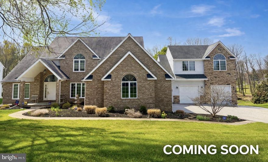 Exceptional custom residence offering over 6,000 sq ft of finished living space, thoughtfully expanded to include a private 2BR suite above the garage—ideal for multigenerational living, an au pair, or extended guest stays.

Situated in the highly desirable Patapsco Park Estates, this home combines space, flexibility, and refined comfort in a way rarely available. A stately exterior, expansive driveway, and rare 5-car garage capacity create an impressive first impression.

Inside, you’ll find a seamless blend of elegance and functionality, featuring hardwood flooring on two levels, generously sized living areas, and a layout designed for both everyday living and upscale entertaining. With 6 bedrooms, 5 full baths, and 2 half baths, the home offers the ideal balance of comfort and privacy.

The expanded upper-level suite above the garage provides its own distinct living space with vaulted ceilings—perfect for guests, extended family, or flexible use.

Outdoor living is equally impressive with an expansive  663 sq ft TimberTech composite deck, professionally designed with integrated lighting, multiple entertaining areas, and a custom stair system—creating a true extension of the home while offering long-term durability and low maintenance.

What truly sets this home apart is its location and lifestyle—offering a private, spacious setting while remaining close to shopping, dining, major commuter routes, and Patapsco State Park. Located within the highly sought-after school district, known for strong academic performance.

A rare opportunity for those seeking space, flexibility, and elevated living in one of Howard County’s most desirable communities. PHOTOS COMING SOON!