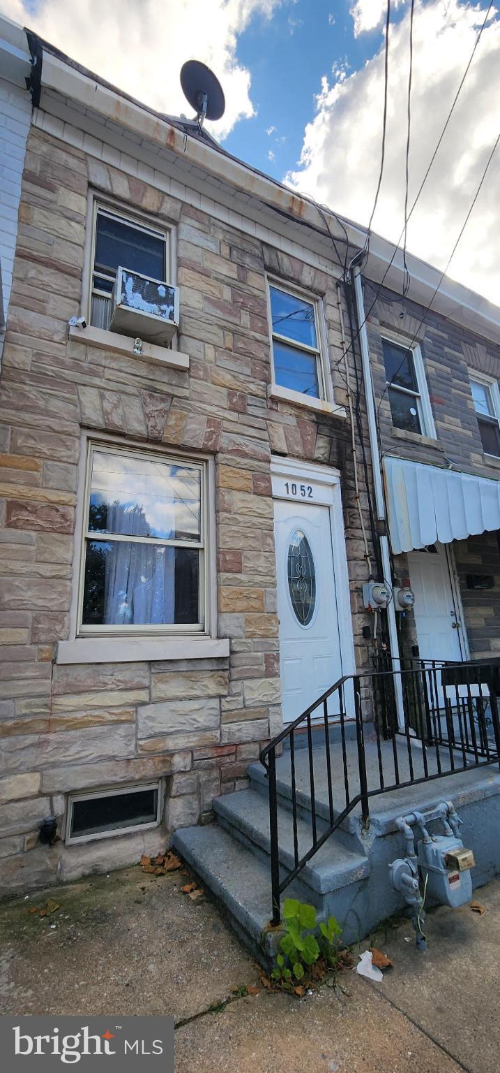 Discover a hidden gem in this charming 1900-built townhouse, perfect for savvy investors seeking a property with strong potential returns or first time home owners. This traditional brick home features three spacious bedrooms and a full bathroom, offering ample space for comfortable living or rental opportunities. With 990 square feet of untapped potential, the unfinished basement presents an exciting opportunity for customization-transform it into a cozy family room, or a home office to maximize your investment. Located in a vibrant community, this property is poised for appreciation, making it ideal. Don't miss your chance to invest in a property that combines character, potential, and a prime location. Embrace the opportunity to create value and watch your investment flourish! *Sale is contingent upon seller finding suitable housing*