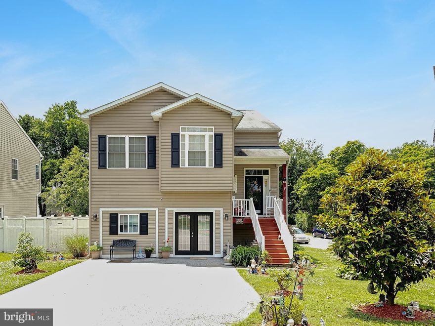 THIS is the house you have been waiting for! Still plenty of time left this summer to enjoy the tranquil outdoor space! Beautifully maintained split-level home on a large flat lot. 12' vaulted ceilings in the living room, kitchen, and owners suite! Skylights! Two fireplaces! Four bedrooms (possible 5th) and three full bathrooms! Soft close cabinets! The two-car garage has been converted into living space. Fully insulated with heat & A/C. This space would make the perfect home office as it has a private entrance for clients to enter. Work and live from one location! Don't need a home office? This bonus room can be a 5th bedroom, yoga/exercise room, man cave . . . you name it!! The home features a front driveway and a side shared drive to accommodate all of your vehicles! The vinyl privacy fence  provides a double gate large enough for most boats! Speaking of boating . . . this house is only two blocks from the water with a public launch.  This home boasts wonderful outdoor spaces -- 2 porches, a deck off of the dining room and a hardscaped fire-pit area! This is your party-house or private oasis . . . you decide! Come see this home today! It won't last long!!