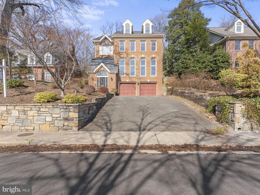 Newly Updated! Step into luxury living with this stately all-brick masterpiece located in the heart of one of Alexandria's most prestigious neighborhoods. With five bedrooms, four bathrooms, elevator to four finished levels, and an array of impressive features. this home is sure to impress.The classic exterior and meticulous landscaping welcome you to the oversized 2 car garage. 

The gourmet kitchen has custom cabinetry, and ample counter space for culinary creations. Gleaming hardwood floors flow seamlessly through the main level, adding warmth and charm to the living room, dining room, half bath, and great room.
Upstairs, the primary suite is designed for relaxation and privacy, With its generous proportions, huge closets, and a spa-like bathroom, this space offers a luxurious retreat. The additional bedrooms are equally impressive, providing ample room for all residents and guests.
The second upper level is light filled and open, perfect for an office and sitting room away from the rest of the home.

On the entry floor, there is  a bedroom and full bathroom, cedar closet and storage, and  a versatile living  space that can be used as an exercise room, recreation area, or media room, catering to your specific needs and lifestyle.

Outside, the fenced yard provides a tranquil oasis, perfect for outdoor entertaining or simply enjoying the serene surroundings.

Don't miss the opportunity to own this magnificent residence, where timeless elegance meets modern luxury. Contact us today to schedule a private viewing .