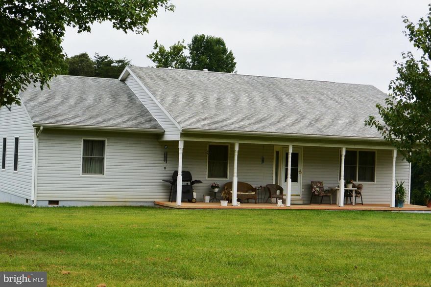 If you're looking for country living, this is it! 7+ acres of peacefulness about 20 minutes from Fredericksburg. Handicap Accessible One Level Home with large country kitchen, hardwood floors, above ground pool, 30'X40' heated Butler building with concrete floor.  Fire & Rescue about 1.5 miles from property. :) Come enjoy country living!