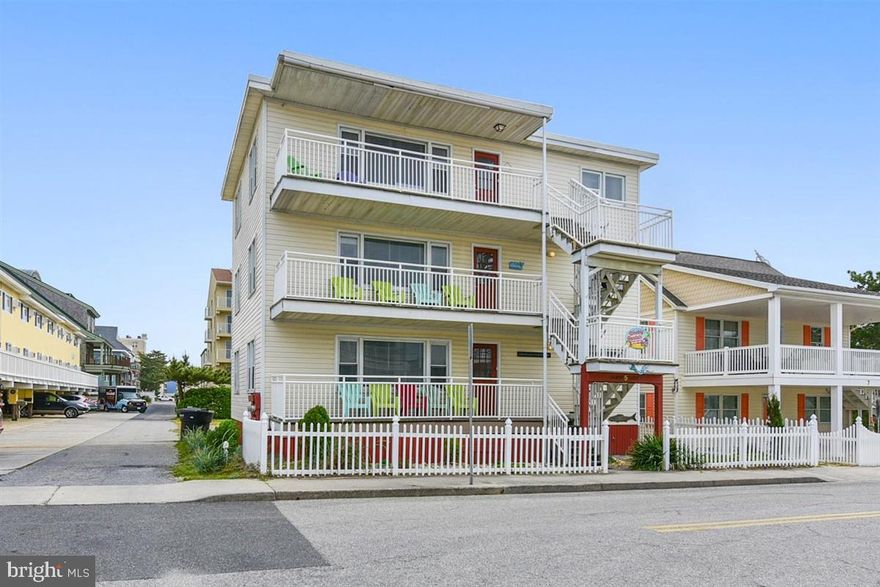 INVESTOR ALERT!!!  Over $90,000 in rental income! This is the one you have been waiting for!   A boutique building with three 3BR/3BA units steps from the beach with proven rental income.   Each of these spacious units has been updated and you will love the layout.  There are ocean views from the inside and the balconies of the second and third floor units.  Each unit is completely turnkey with all the furnishings, fully equipped kitchens and a washer and dryer in each unit.  Each unit sleeps 10 people. There is off street parking behind the building for 12 cars and potential for 4 unit structure. This property is located steps from the beach on 43rd street.  Come take a look today. It's at 5 43rd street.  Look for the sunny yellow building called Sandy Toes.