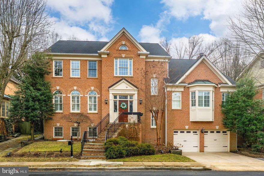 Beautifully updated and set in the heart of Spring Valley, one of Northwest DC’s most cherished neighborhoods, this home offers a wonderful balance of elegance and comfort. The main level features hardwood floors throughout and a layout that feels both inviting and functional, ideal for everyday living and effortless entertaining. The home features a recently renovated chefs’ kitchen with custom cabinetry, premium countertops, professional-grade appliances, and an adjoining breakfast area. You’ll also find a spacious great room with a gas fireplace, a separate living room with its own gas fireplace, a formal dining room, a private office/den, and a powder room. An elevator serves all three floors, adding an extra layer of convenience. Upstairs, the generous primary suite includes a beautifully renovated spa-like bath with designer fixtures and a luxury walk-in shower, and two walk-in closets. Three additional bedrooms complete the upper level: two share a Jack-and-Jill bath and the fourth has its own en suite, along with a large laundry room. The lower-level features high ceilings, a spacious recreation room, a full bath, abundant storage, and direct access to the attached two-car garage with Tesla charger. There is also the flexibility to add a fifth bedroom if desired.  The home is equipped with a fully integrated Ring security system and Ecobee smart climate control.  Outside, an updated flagstone patio stretches the length of the home, creating a perfect setting for entertaining or relaxing. With its thoughtful updates, flexible spaces, and prime Spring Valley location, this home truly captures the best of Northwest DC living. Known for its quiet, tree-lined streets and strong sense of community, Spring Valley offers walkable access to neighborhood shops and dining (Millies, Wagshalls, Pizza Paradiso, etc.), nearby universities and parks, and major commuter routes. Just minutes from downtown DC and Bethesda, it’s a location that makes everyday living both convenient and connected.