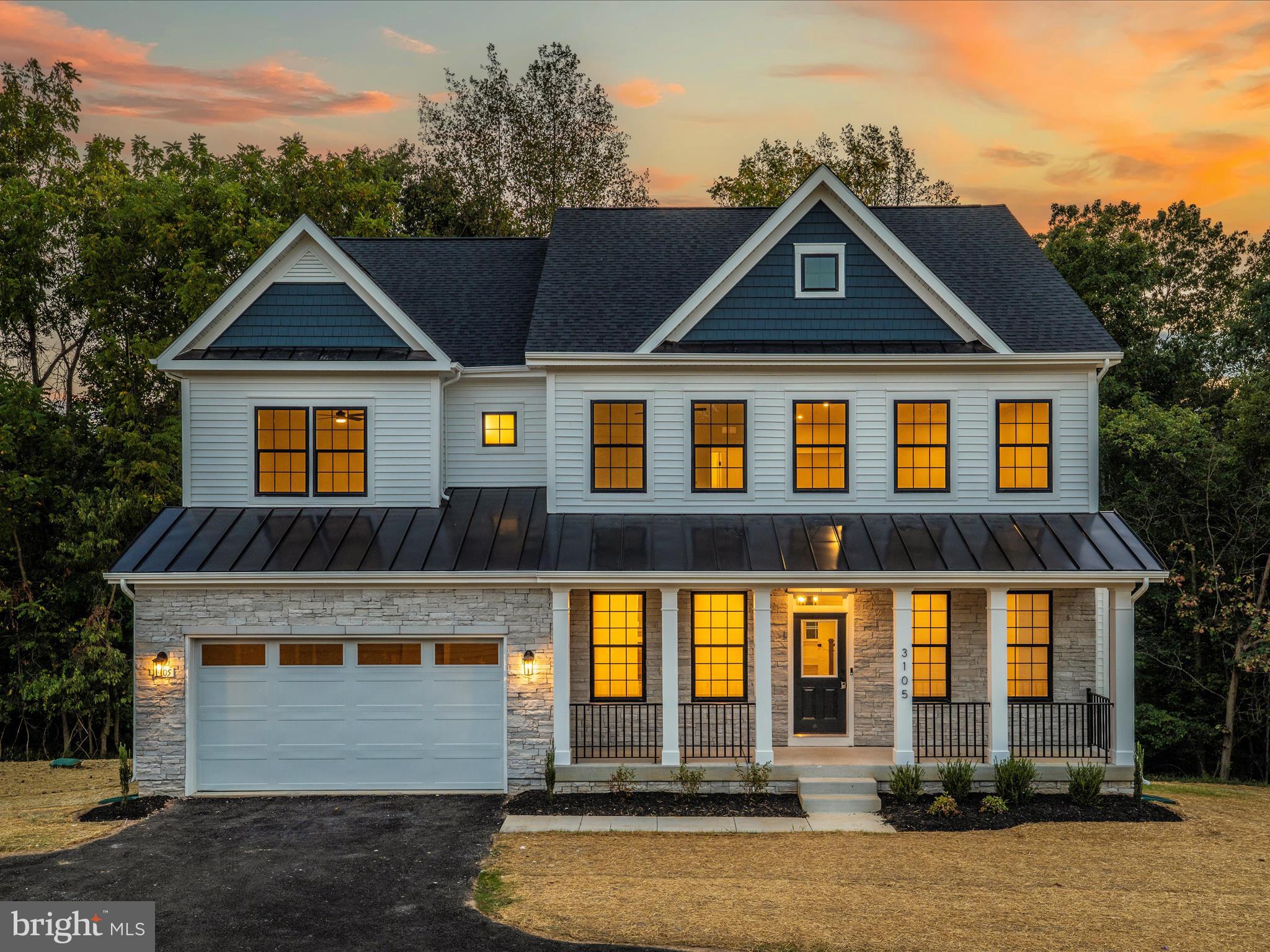 Experience modern luxury at The Athens, Elevation 3, now complete on a private 2.9-acre partially wooded lot in the highly sought-after Middletown school district. Offering over 3,500 square feet, four bedrooms, and three and a half baths, this home blends space, style, and sophistication.
Enjoy nine-foot ceilings on every level, a two-car front-load garage, and a gourmet kitchen with designer finishes and top-of-the-line appliances. Premium flooring, custom trim, and elegant details enhance every room, creating a refined yet comfortable atmosphere. The walkout lower level adds 1,500 square feet of flexible space—perfect for a home gym, media room, or guest suite. Built with energy-efficient materials, The Athens delivers sustainability without compromise. With only three exclusive homesites bordering 135 acres of pristine parkland, Americus Manor offers a rare combination of privacy, seclusion, and convenience. Additional homesites and floor plans are available.