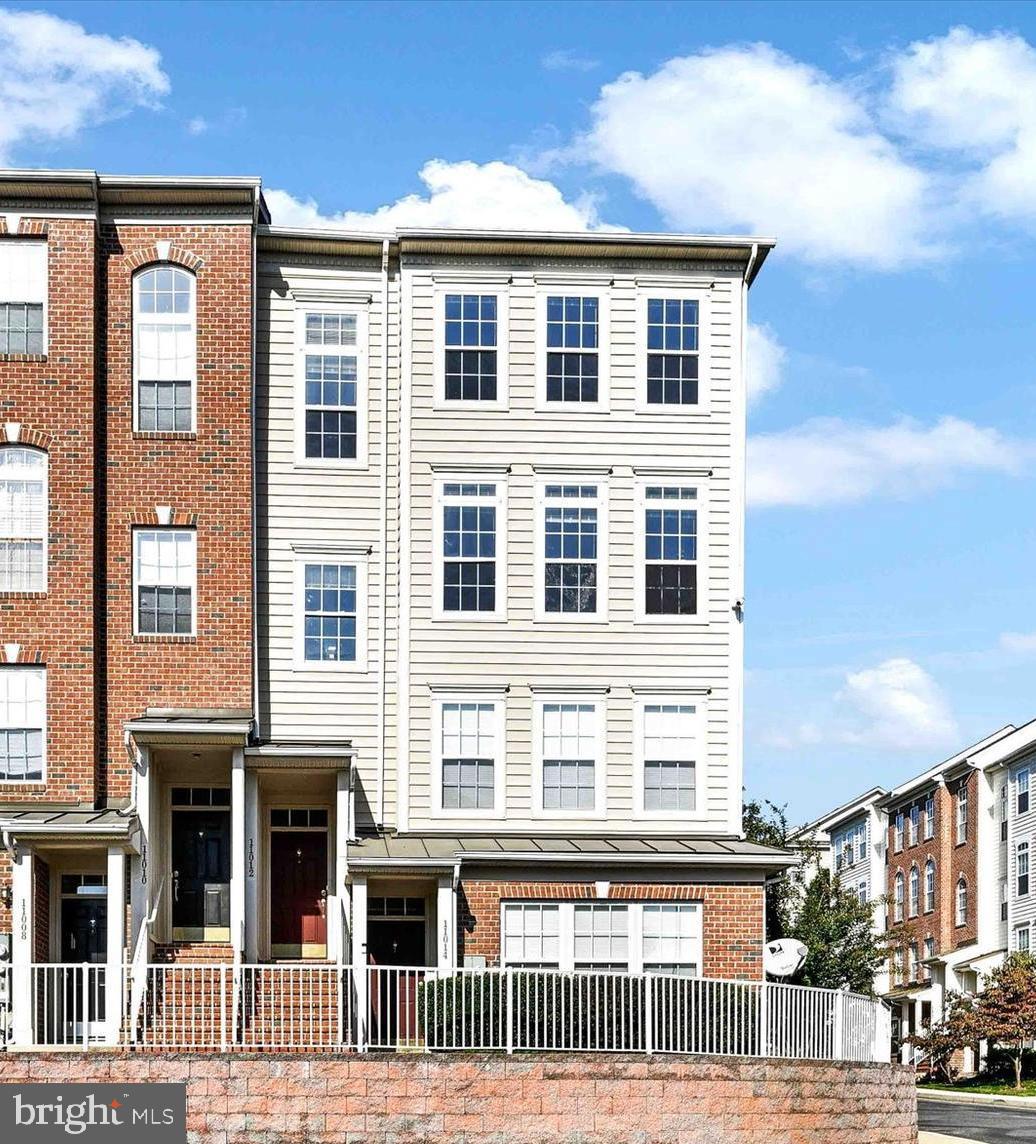 If you love natural light, this is the condo you've been waiting for! This spacious end unit with an attached 1 car garage in The Villages of Mill Run is perfectly appointed with new carpet, new tile floors, high ceilings, 42" kitchen cabinets, stainless steel appliances including a new microwave and 3 year old refrigerator, corian countertops, a tiled backsplash, a breakfast bar, recessed lighting, ceiling fans, and a gas fireplace. The gorgeous master suite has vaulted ceilings, a walk-in closet, and en-suite bathroom with a double vanity, a separate tiled shower, and a soaking tub. The two other nice sized bedrooms share a hall bath with new luxury vinyl flooring. Enjoy having your washer and dryer on the bedroom level, too. All you have to do is move in! At this price, it won't last long!