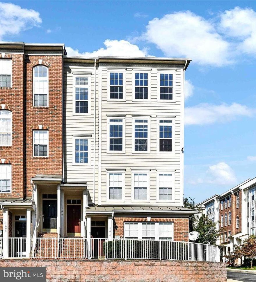 If you love natural light, this is the condo you've been waiting for! This spacious end unit with an attached 1 car garage in The Villages of Mill Run is perfectly appointed with new carpet, new tile floors, high ceilings, 42" kitchen cabinets, stainless steel appliances including a new microwave and 3 year old refrigerator, corian countertops, a tiled backsplash, a breakfast bar, recessed lighting, ceiling fans, and a gas fireplace. The gorgeous master suite has vaulted ceilings, a walk-in closet, and en-suite bathroom with a double vanity, a separate tiled shower, and a soaking tub.  The two other nice sized bedrooms share a hall bath with new luxury vinyl flooring. Enjoy having your washer and dryer on the bedroom level, too.  All you have to do is move in! At this price, it won't last long!