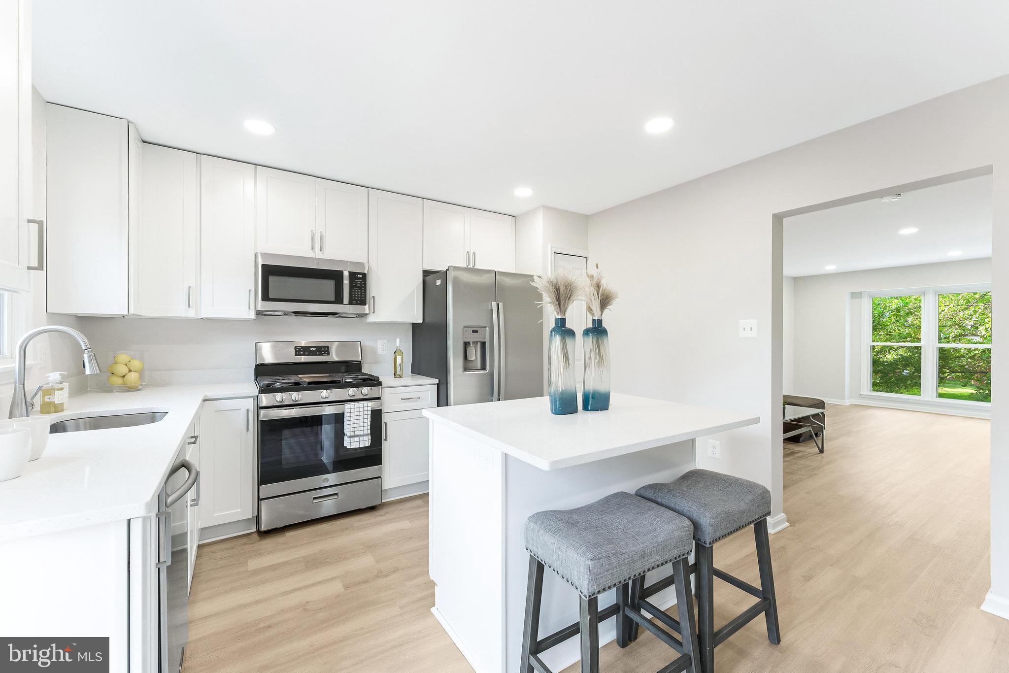 Immaculate, fully renovated townhouse in Fox Creek. BRAND NEW KITCHEN with quartz countertops and stainless steel appliances. Fully finished walk-out lower level with spacious rec room and laundry. Upper level features 3 bedrooms and 2 full baths with high-end renovations. New flooring throughout. Huge deck with stairs to fully fenced yard with custom patio. 1 car garage.