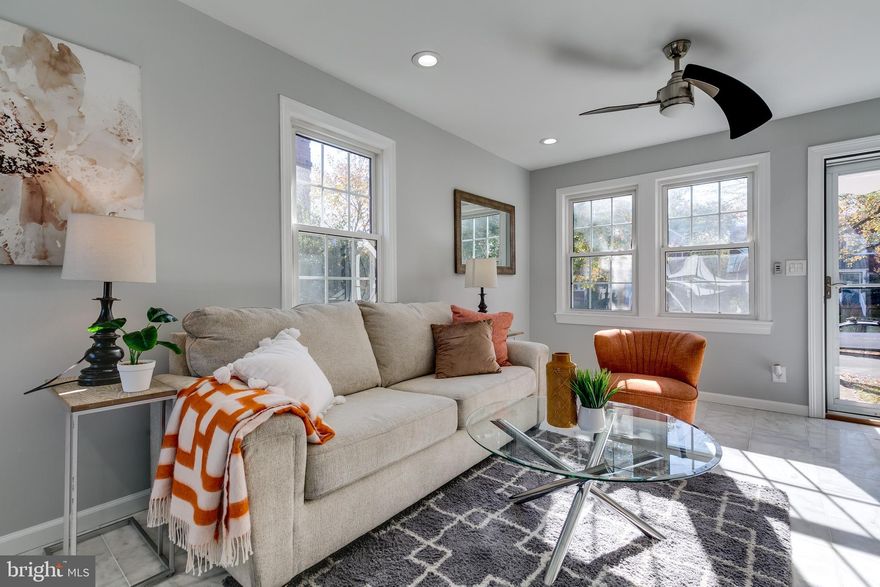 Welcome to this wonderfully renovated end-unit home in pristine, turn-key condition with tons of natural light. The sellers have lovingly maintained this home by installing a new HVAC system (2019), hot water heater (2022), sump pump (2023)  back gate (2023), full painting of the home (2023) and re-surfacing the hardwood floors (2023). Walk everywhere! Numerous grocery stores, restaurants, coffee houses, pharmacies, parks, playgrounds, sports fields, and other retail options are minutes away.  The home has a giant front and side yard, as well as a large deck and massive back yard.  As an added bonus you will love the storage shed, two (2) parking spots, the in-law suite down stairs with a kitchenette and separate entrance that you use for AirBNB or a tenant. Welcome home.