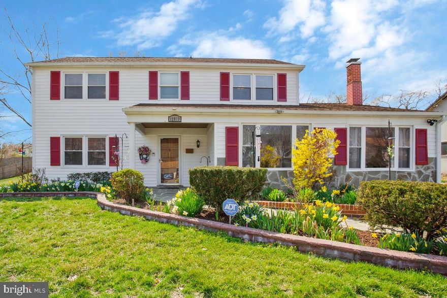 This colonial has so many great features!  Living room has tray ceilings, recessed lighting, wainscotting & built in shelves, kitchen has a pantry, crown molding, granite counters, ceramic tile backsplash and recessed lighting, dining room has recessed lighting and a cedar closet for great storage, family room has a woodburning fireplace & built in desk & shelving. Half bath on main level. Freshly painted screened porch off kitchen plus a patio.  The upstairs is like no other Bowie colonial! Primary bedroom has LVP floors & huge walk in closet, primary bath has heated floors, 2 more bedrooms + a full bath with heated floors.  The fenced backyard is gorgeous!  Shed with electric, furnace & A/C replaced in 2024, warranty conveys. Don't miss it!