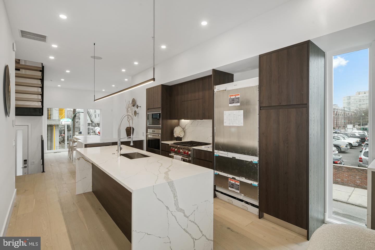 At the end of 2020 the FULL 10-year tax abatement is going away..... This may be your last opportunity to purchase a new home in 19103, within the Albert M Greenfield School catchment, with the FULL 10-year tax abatement. Especially at this price with these amenities! Welcome home to Logan 23, Sensational new 4-story homes with 3-CAR GARAGES, GATED driveway, 5-stop elevators, Smart-home systems (control 4), Roof-deck, multiple outdoor areas, skyline views, and located in the Albert M. Greenfield School Catchment. Tax Abatement approved!! Logan 23 has the exact amenities everyone has been looking for. 8 homes located on quaint Croskey Street and 8 homes on 23rd Street starting at the corner of Cherry Street. This amazing development has a gated driveway and luxury finishes throughout. There is a large deck off the living room, perfect for entertaining and the BBQ. All of the bathrooms have designer vanities, amazing large format tile selections, and custom fixtures with super cool mirrors and lighting choices. The full floor master suite is to die for and includes walk in closets with custom shelving systems, a five piece bathroom with free standing oval tub, huge walk in shower with glass doors, body sprays and his and hers hand held shower fixtures. The elevator takes you all the way to the jaw dropping roof deck, which has stunning views. There are no other homes on the market like LOGAN 23. Fantastic location steps away from the new FITLER CLUB, Philly's only lifestyle club with world-class restaurants & bars, a Field House, study and event spaces. Also steps above Rittenhouse!! More amazing features of the LOGAN 23 homes include, full size laundry rooms with W/D included, designer staircases with metal handrails, multi zone heating and air systems, alarm systems, fireplace and motorized shades options, Kohler plumbing fixtures, LED recessed lights, Gated driveway, and again, 3-CAR GARAGES! Construction is 98% complete, as the photos reflect. The Croskey Street homes are identical to the 23rd Street homes. There are only two corner homes available! All square footage numbers are approximate and include above and below grade square footage. Square footage should be verified by the buyer. It is the responsibility of the buyer to verify real estate taxes.