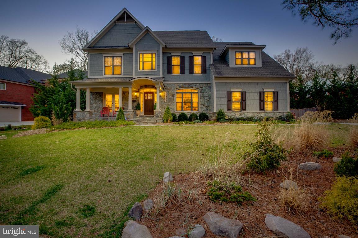 This stunning, one of kind, custom built home from acclaimed Beacon Crest Homes, is an entertainers dream home! This spectacular home features a wide, open concept floor plan, flooded with natural light and boasts expert craftsmanship and custom millwork throughout. The main level features 11 FOOT ceilings, owner’s suite with spacious en-suite bath, private office with French glass doors and a spacious gourmet kitchen with enormous island, designer granite counters and floor to ceiling custom cabinetry. The main level also features formal living room and dining room spaces as well as a spacious family room with coffered ceiling and floor to ceiling stone fireplace, all opening to a custom designed screened porch with 15’ cathedral ceiling, remote controlled movie screen and beautiful outdoor oasis.