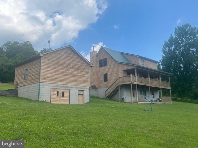 Freshly painted! 4 BR, 3BA waterfront cabin on 6.4 acres, fronting on Bear Creek. 2400+/- total sf. Inside, a cozy stone fireplace (gas), hardwood floors, spacious loft area with built in storage, eat-in kitchen, AC and a huge game room on the lower level with bar and pool table. Enjoy front and rear covered porches overlooking the mountains and creek, fire-pit, outbuilding and a 2 level detached garage with lower level storage area. Includes whole house generator and conveys mostly furnished minus decor and collectibles. Potential for one level living. Secluded area with Deep Creek Lake and shopping nearby, you will love the outdoor feel and privacy!