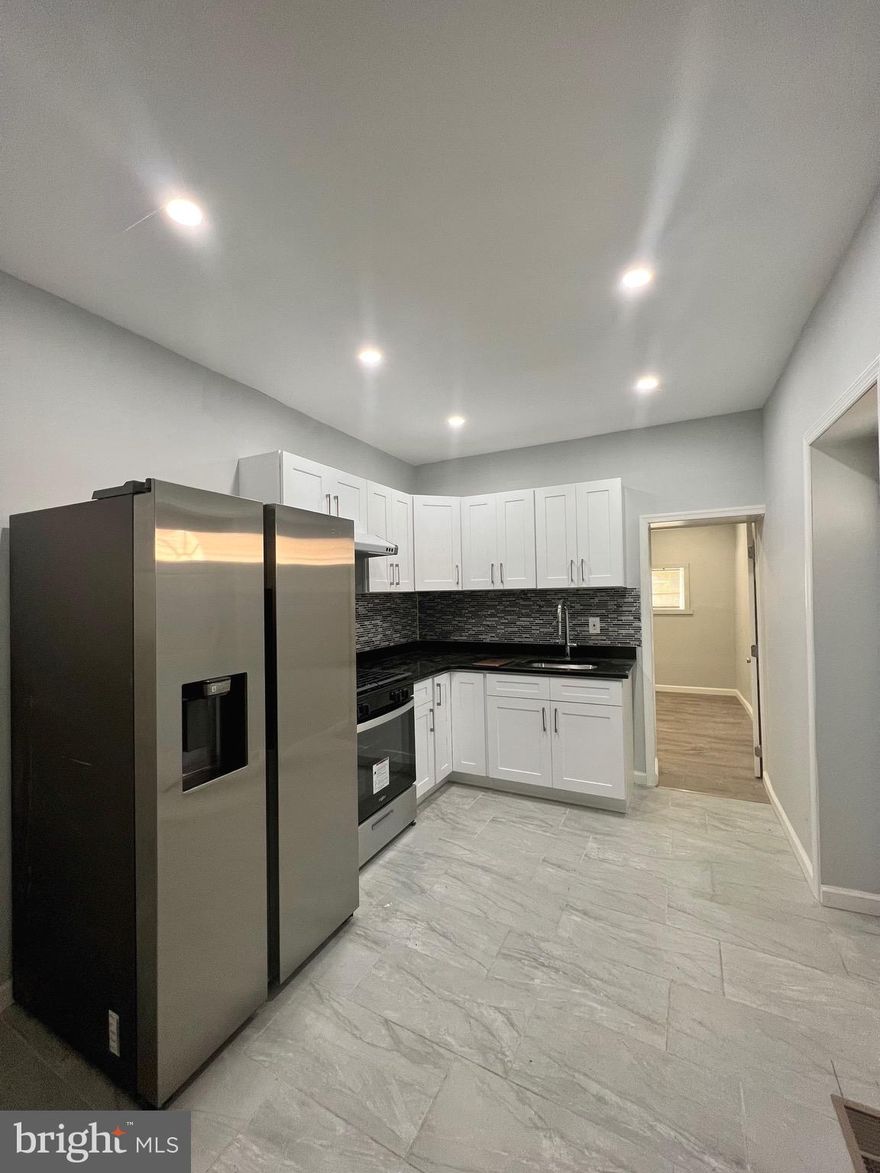 Welcome to 2108 E Cambria St — a beautifully renovated rowhome offering 4 bedrooms, including one on the main level, perfect for guests, a home office, or flexible living. 

Step into a bright, modern interior featuring brand-new flooring, stylish finishes, and an updated kitchen with sleek cabinetry and contemporary design. Upstairs, you’ll find three comfortable bedrooms and a beautifully renovated full bathroom.

Enjoy peace of mind with a brand-new roof and all-new windows, adding long-term value and energy efficiency to your home.

Need extra space? The partially finished basement provides the perfect bonus area — ideal for a home gym, playroom, storage, or creative studio.

Out back, enjoy a private outdoor area great for relaxing or entertaining.

With quick access to public transportation, I-95, and Fishtown hotspots, this home is move-in ready and full of potential.

Whether you’re buying your first home or looking for a smart investment, 2108 E Cambria St checks all the boxes. *Currently leased at $1600 monthly with a lease until October 2026. Flexible tenant.* Schedule your showing today!