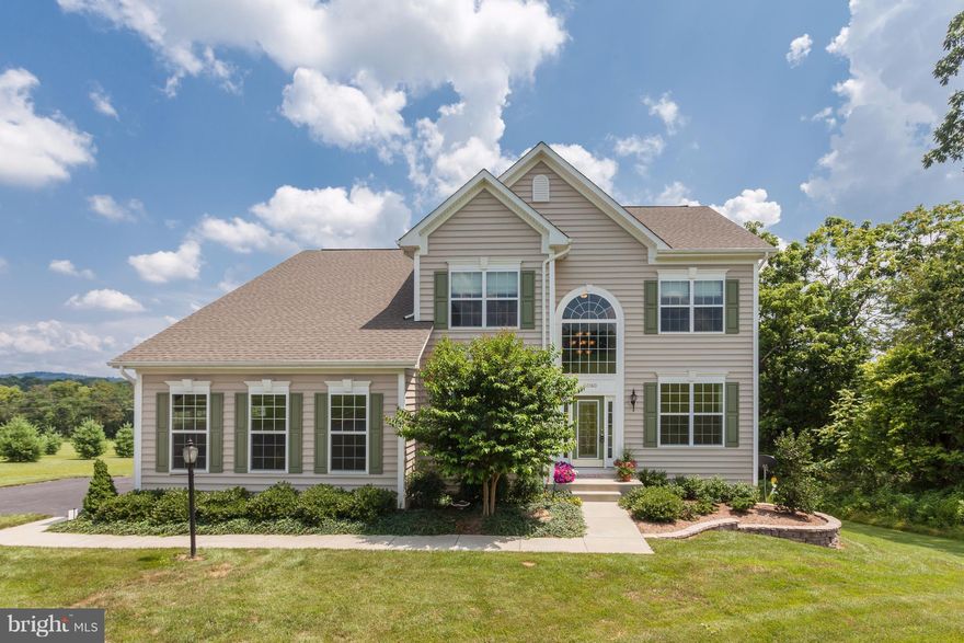 Relax,Grill & enjoy nature on new composite deck w/steps to lovely paver patio! Gorgeous wide plank hardwoods throughout main & attractive metal balusters adorn dual staircase. Entertain in your open & welcoming kitchen with ample cabinets & spacious granite island - just perfect for gatherings. Tile & Granite Baths. Landscaped lot w/trees on cul-de-sac! Easy commute to DC via MarcTrain. Must See!