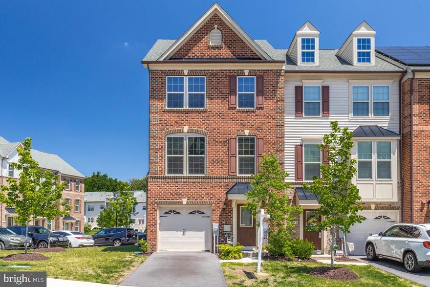 Spectacular Almost New (2016) - 4 Story Townhome with 3 Bedrooms & 3.5 Bathrooms.  Spacious End Unit with Open Floor Plan and Bonus / Family Room on Entrance Level with slider to Rear Yard.  Second Floor Open Concept has Gourmet Kitchen with Upgraded Granite Countertops, Gas Stove, Espresso Cabinets and Stainless Steel Appliance with Sliding Glass Door leading to the Large Second Story Deck.  Beautiful Hardwood Floors in featured in Kitchen and Dining Area.  Big Living Room with Lots of Natural Light.   Large Primary Bedroom with Walk - In Closet, Featuring Owner's Bathroom with Soaking Tub and Separate Shower.  Spacious 4th Floor Bedroom with it's own Bathroom and Large Walk-Out Patio providing a Light, Bright, Airey atmosphere.  Would also be perfect for Home Office or Game Room.  Desirable Parkside Community with lots of Amenities, Community Pool, Community Center, Fitness Center & Tot Lots.  Close to Shopping, Dining and minutes from 295 & the MARC Train.  Less than 30 minutes to Baltimore, Annapolis and Fort Meade.