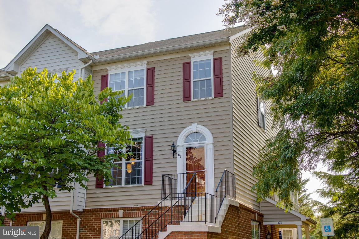 END UNIT 2 Story Condo!! This home has tons of natural light in all rooms! The main floor has an open concept between the living space, kitchen and breakfast area. Great entertaining space with high ceilings. Hardwood floors throughout first level. Great private deck on the back of the kitchen! 2nd floor offers two spacious bedrooms and nice walk-in closets! Master bedroom offers additional upper windows for view of the trees and more natural light. The best location to access route 50 and 97, downtown Annapolis and local shopping and restaurants!