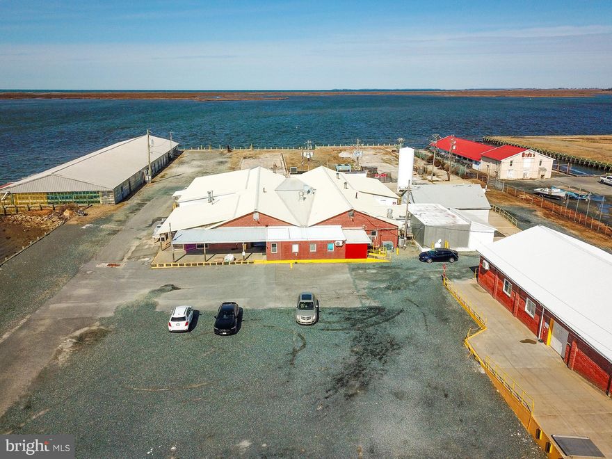 ALL SHOWINGS ARE BY APPOINTMENT ONLY---- A comprehensive data sheet on the facility is available in the documents sections of this listing. A full brochure on the property is available in the documents section of this listing by contacting the listing agent or your agent. ---- The Handy Seafood Processing facility is located in historic Crisfield Maryland on the Little Annemessex River. This waterfront facility primarily processes soft crabs, oysters, and value-added items such as crab cakes and breaded seafood items but can be adapted for a variety of different products. Opportunities range from capitalizing on the region's renowned seafood with aquaculture and seafood processing to attracting tourists through recreational offerings like boat tours and waterfront event venues. The facility waterfront is fully bulkheaded. There are two building pad areas on site that can be used for constructing additional structures. ----

R&D Test Kitchen
Office and Warehouse Areas With Dock High Access 
Automatic LED Light System
24-7 Monitoring Security System