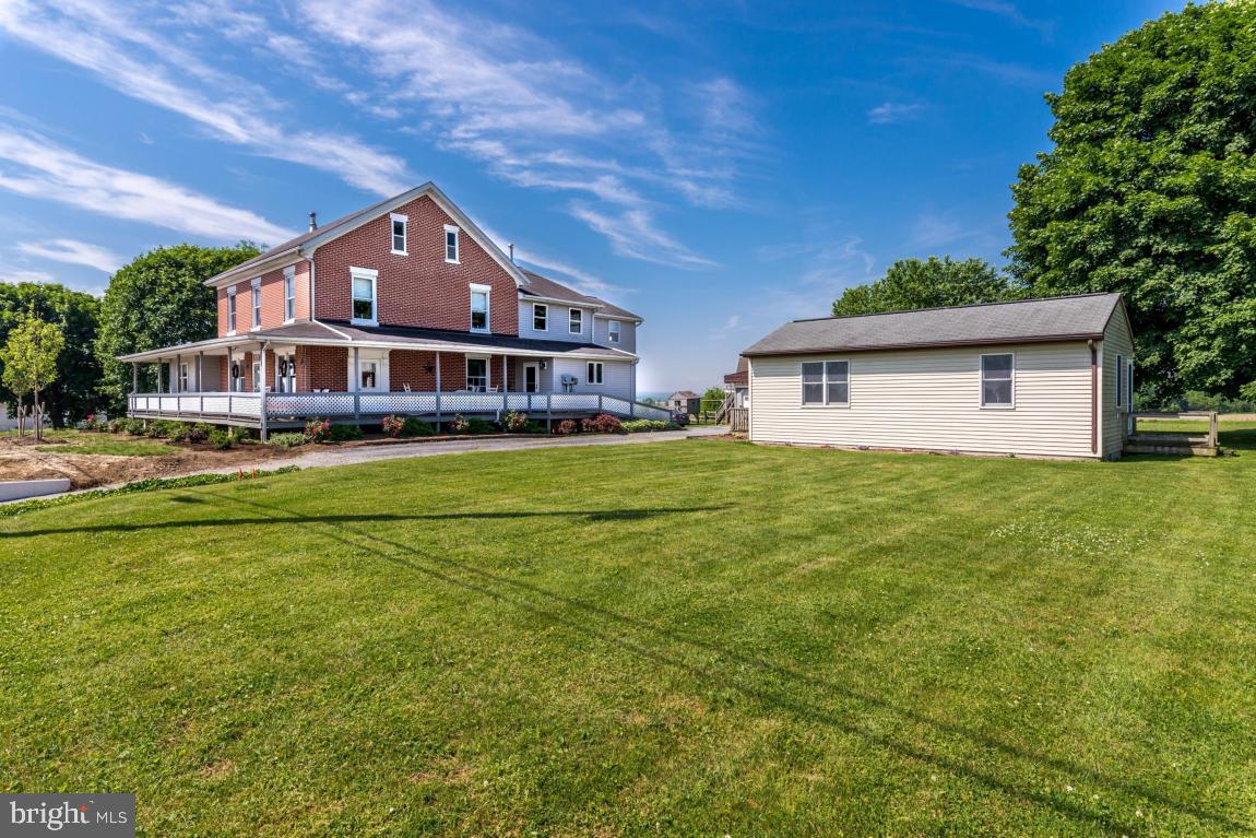 Amazing opportunity to own your own, gorgeous farm house w/ a spacious wrap around porch! Accommodations for lg family, bed & breakfast, farming, etc... Close proximity to route 30, outlets & farming communities! 7 Spacious bedrooms, 3 1/2 baths, Country kitchen w/ new Georgia Heart Pine wide plank flooring, fencing for goats & other livestock, outbuildings, separate cottage w/ a bed and bath for entertaining, gorgeous sunset views!