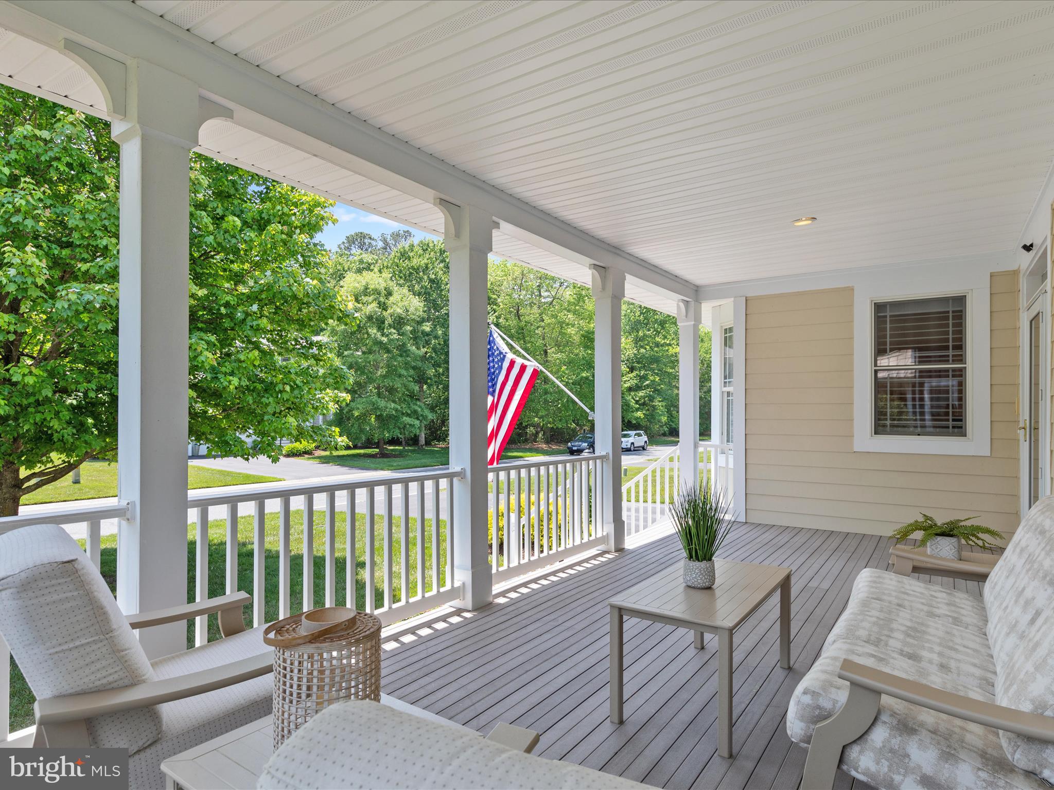 Nestled on a premium golf course lot with extended space between neighboring homes, this exceptional residence in the prestigious gated community of Glen Riddle offers a rare combination of refined living, privacy, and coastal convenience. Ideally located just minutes from the sparkling beaches of Ocean City, the natural beauty of Assateague Island, and the charm of historic Berlin, this home is the perfect haven for those seeking both serenity and sophistication.
Curb appeal shines with fresh landscaping, an irrigation system, and a gutter leaf protection system, all complementing the home's Southern-style covered front porch that radiates warmth and welcome. Step inside to discover a spacious open floor plan adorned with new luxury vinyl plank flooring throughout the main level and elegant deep crown molding that adds a touch of timeless detail.
The heart of the home is a stunning gourmet kitchen, beautifully updated in 2022 with level one Quartz countertops, a GE Induction cooktop, under-cabinet lighting, stylish backsplash, and 42" cabinetry that provides abundant storage. The oversized island with seating and a walk-in pantry make this kitchen both functional and beautiful—perfect for everyday living and entertaining alike. The adjacent dining area invites gatherings and special occasions.
A soaring two-story great room is anchored by a cozy gas fireplace flanked by custom built-ins, while atrium doors open to a serene 3-season room with stacked windows and an adjoining composite deck—ideal for al fresco dining and soaking in the picturesque golf course views. Throughout the home, recessed LED lighting, high-end plantation shutters, and custom window treatments elevate every space.
A den just off the foyer offers built-in cabinetry, a desk with under-cabinet lighting, and a new privacy door, making it the ideal home office. The main-level primary suite is a luxurious retreat with an ensuite bath featuring a dual-sink vanity, soaking tub, stall shower with bench seating, and a private water closet. Upstairs, a versatile loft connects two generously sized bedrooms and a shared full bath. A dedicated storage closet with shelving adds to the home’s practicality.
Additional features include a two-bay garage with storage racks, blown-in attic insulation, and a high-efficiency HVAC system for the main level, newly installed in July 2023.
Living in Glen Riddle means enjoying an unmatched lifestyle, with access to both private and public championship golf courses, a marina with boat ramp and kayak storage, outdoor pool and tennis courts, a state-of-the-art owner’s clubhouse featuring a fitness center, game room, library, and meeting space—not to mention the on-site Ruth’s Chris Steak House. This beautifully appointed home, with its expansive setting and premier location, truly embodies the best of coastal luxury living.