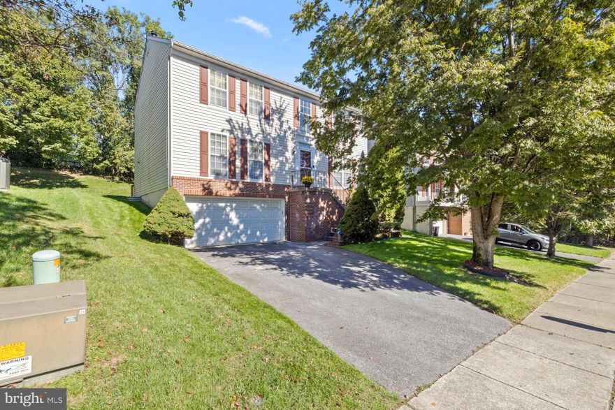 THIS 4BDRM 2 ½ BATH HOME WITH 2 CAR GARAGE FEATURES LAWN SPRINKLER AND SECURITY SYSTEM WITH LARGE DECK FOR ENTERTAINING WITH MOTORIZED SUNSETTER AWNING AND NEW A/C.  THE BEDROOMS ARE FULLY CARPETED. THE OWNER'S  SUITE WITH BATH HAS SEPERATE TUB AND SHOWER.  THE MAIN LEVEL FEATURES SEPERATE LIVING AND DINNING ROOMS WITH CUSTOM BLINDS.  THE FAMILY ROOM HAS A GAS FIREPLACE AND HARDWOOD FLOORING AS DOES THE LIVING ROOM,DINING ROOM  AND 2 STORY FOYER.  THE LOWER LEVEL IS FULLY CARPETED AND INCLUDES A CUSTOM POOI TABLE AND HANDCRAFTED BAR IMPORTED FROM TURKEY.  THERE IS ALSO A RUFF-IN. THE HOME IS SITUATED IN A QUIET NEIGHBORHOOD ONLY MINUTES AWAY FROM FT MEADE/NSA, BWI THURGOOD MARSHALL IAP AND MAJOR ROADS LEADING TO BALTO/WASH AND ANNAPOLIS.  THERE ARE MANY SHOPPING, DINNING AND ENTERTAINMENT OPPORTUNITIES AT NEARBY ARUNDEL MILLS MALL.