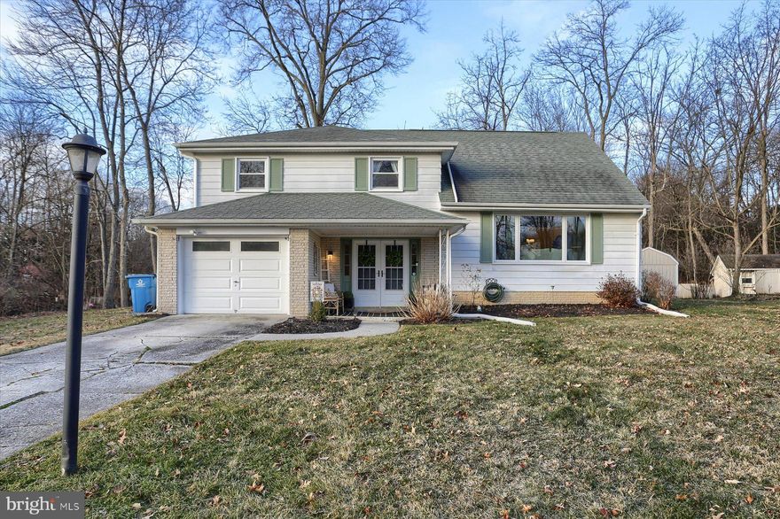 Welcome to a delightful 3-bedroom split-level home nestled in Skyline View.  Step inside and be welcomed by the spacious tiled foyer and the warmth of a wood-burning fireplace in the lower-level family room, creating an inviting atmosphere for cozy gatherings during chilly evenings.  Just a few steps up,  you’ll find yourself welcomed into the main level, which boasts formal living and dining rooms with gorgeous original hardwood floors - the perfect setting for casual family meals, gatherings, and formal entertaining. The kitchen is a chef's delight, featuring ample counter and cabinet space, making meal preparation a breeze. Above, the hardwood floors continue throughout the well-appointed bedrooms, including the primary bedroom with dedicated access to the shared full bath. The finished bonus room in the attic adds a unique touch, providing a versatile space for a playroom, home office, gym, or quiet reading nook.  Outside, the covered rear patio offers a tranquil haven with ceiling fans for hot summer days. Enjoy al fresco dining, entertain guests, or simply unwind while taking in the peaceful views of your large tree-lined backyard and the gentle babbling of the adjacent creek.  This home offers a rare combination of privacy and community afforded by an established neighborhood while providing convenient access to local amenities, schools, and parks.  This home is more than just a residence; it's a sanctuary where comfort meets convenience and functionality. Don't miss the opportunity to make this property your own and enjoy the unique charm it has to offer.