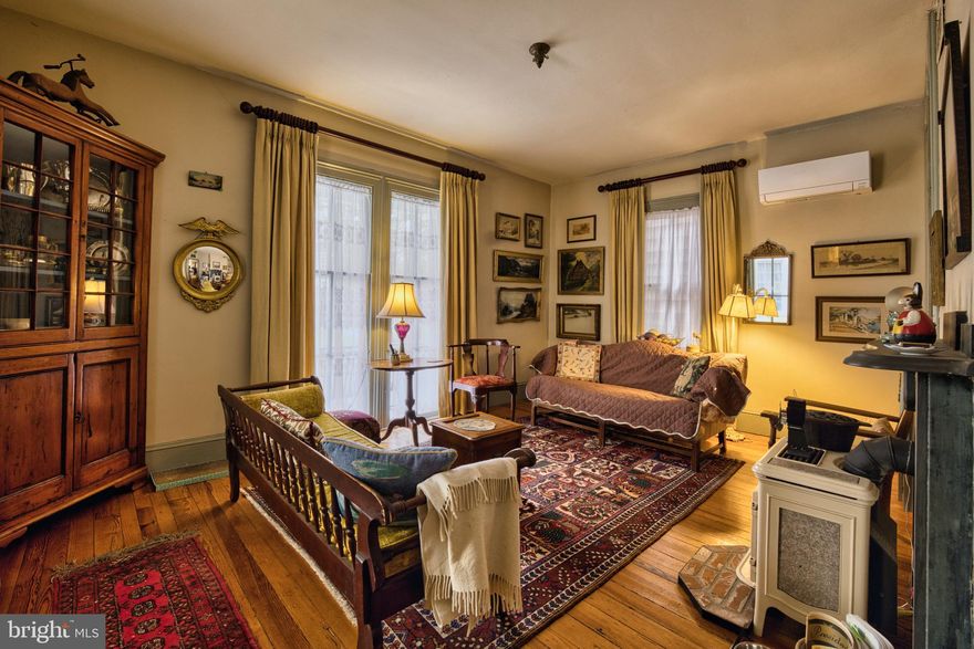 Lovely historic home in the heart of downtown Centreville. Walking distance to all the town has to offer. This home boasts so many wonderful features, from the private but yet easy to maintain backyard to the tranquil enclosed porch perfect for all 4 seasons. During the holidays enjoy watching the Centreville Holiday Parade right from the comfort of your front porch, everyone will want an invite to enjoy that! The main level is made just right for easy flow from room to room or close them off and enjoy comfort in the back of house with the flow from kitchen to porch for entertaining. The 2nd floor has 3 bedrooms and a fabulous full bath with your choice, soak the day away in your clawfoot tub or a quick easy shower in the separate enclosed shower. There is a separate HVAC that services this floor and the 3rd floor. The 3rd floor is perfect for teens or a hobby room, with a sleeping cove and plenty of room to spread out this will soon be a favorite room to escape to! Plus, there's additional storage on the 3rd floor. Seller added 3 mini splits to the 1st floor in 2025, as well as leaf lifters to the gutters that come with a lifetime warranty. The trim and shutters have been freshly painted as well. Check this beauty out today!