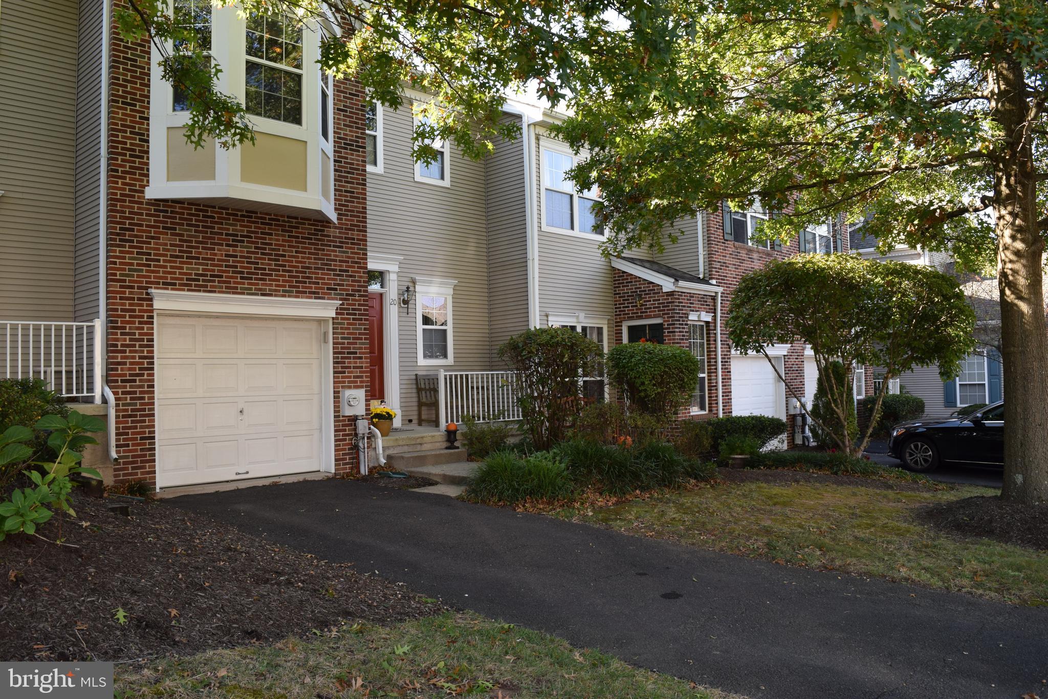 Welcome to 20 Tankard Lane, a beautiful two story brick front townhome in the highly desirable Heritage Hills community in Washington Crossing with a one car attached garage. This prime real state is located minutes from historic Washington Crossing and still has easy access to the major roadways. New solid real hard wood floors on first and second floor with new hard wood stair; the kitchen has wood kitchen cabinets and new quartz countertops. Off of the kitchen there is a new sliding glass door that leads to a private deck. The house embeds details along with new crown molding kitchen counter and hard wood floor installed by European craftsman. Modern special & recessed lighting; The family room offers a wood burning fireplace, ceiling fan and soaring windows allowing in an abundance of light. Upstairs you'll find the master bedroom; large walk in closet with organizers; the master bathroom offers beautiful tile, new shower door, separate soaking tub & vanity. Down the hall is the second bedroom with more crown molding & a double wardrobe closet. There is a spacious linen closet and neutral guest bathroom. Head on down to the finished basement perfect for a movie room, game room, office space etc. There's still plenty of storage throughout the home. This town home located in a great community offering pool & tennis courts amenities close to commute to New York City and Philadelphia!!!!!!!