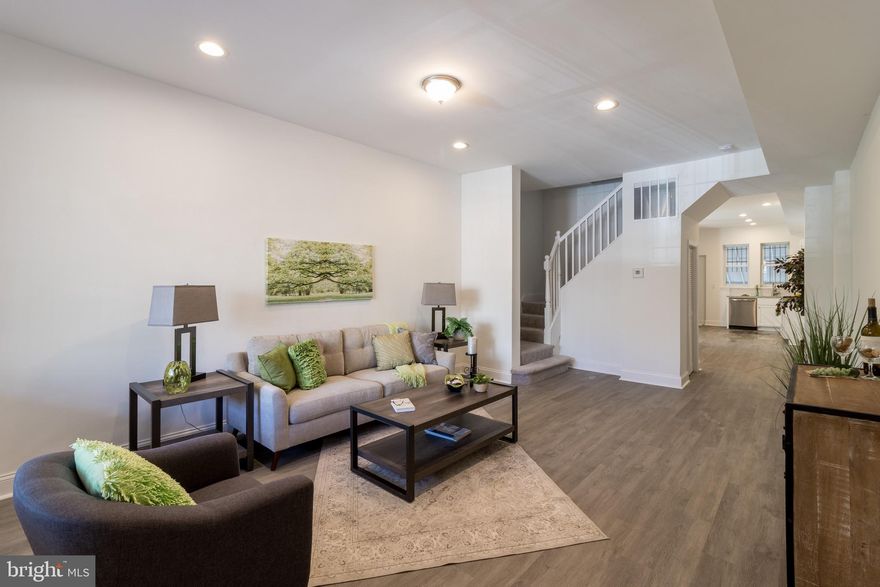 Welcome home...This recently renovated home is walking distance to The Baltimore Zoo, Druid Hill Park and  accessible to all amenities. Open floor plan and tons of natural light and space..Huge basement that can be used as a bedroom or for entertaining. The upper level has 3 full bedrooms and a primary bath...there is a 3rd level that can be used as a bedroom, study or storage space..the potential is endless...bring an offer today...won't last long...