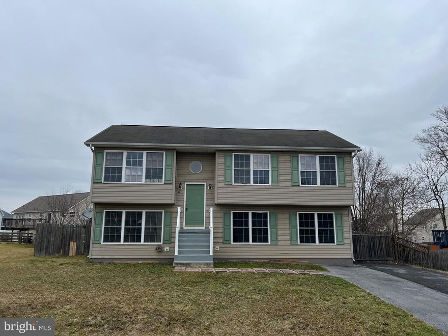Spacious split level home sits in a convenient location near the VA center minutes to Rte. 9 for easy access to Charles Town or Martinsburg locations.   Fully equipped kitchen w/ island opens to living room.  Laminate flooring throughout and potential for two very spacious primary bedrooms.  Fenced rear yard and rear deck.