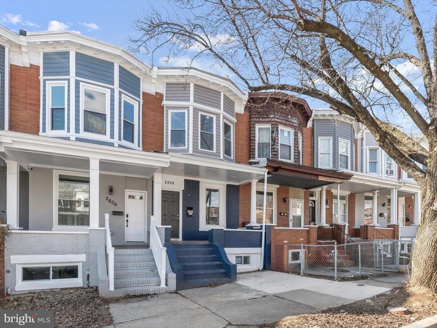 Completely renovated and nestled in the Lake Clifton community, this stunning home offers modern elegance with thoughtful upgrades throughout. The bright living room welcomes you with gleaming hardwood floors, while the eat-in kitchen boasts soft-close cabinetry, sleek stainless steel appliances, quartz countertops and backsplash, and a casual dining area. A main-level bedroom with hardwood floors and an en-suite full bath, along with a convenient powder room, complete the first floor. Upstairs, the primary suite features a charming bow window and an en-suite full bath, while a second en-suite bedroom, a bonus room, and a laundry room provide ample space and convenience. The lower level offers a versatile recreation room, a fourth bedroom with an en-suite full bath and direct access to the convenient parking pad, an additional bonus room, plus plenty of storage. Outdoor highlights include a covered front porch and a rear parking pad for added convenience.