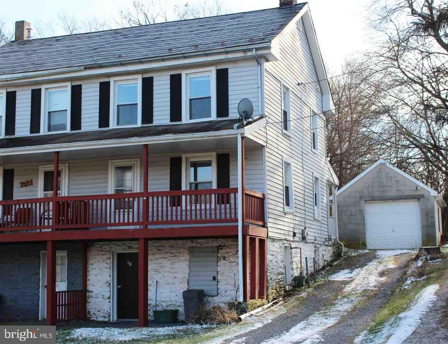 GREAT INVESTMENT FOR THE FUTURE!  OWN YOUR 1ST HOME OR POSSIBLY RENT THIS DUPLEX WITH A ONE CAR GARAGE 21 X 15 * PLAY HORSESHOES IN THE BACK YARD * ACROSS THE STREET FROM THE PARK * ALL APPLIANCES STAY* REPLACEMENT WINDOWS * KITCHEN WITH OAK CABINETS * COVERED PORCH * BEING SOLD "AS IS" *