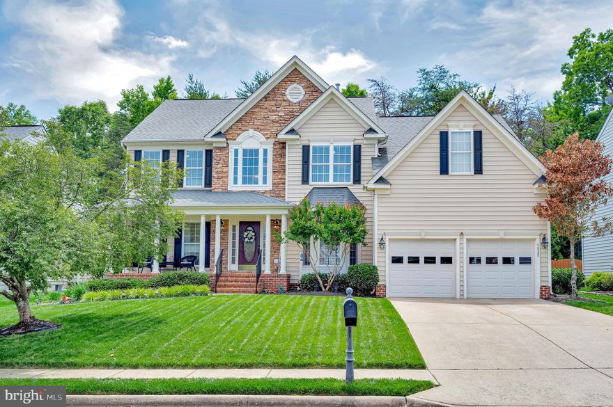 Stop searching, here is the home for you!!  This beauty is immaculate and has everything you could want.  Sit on your front porch and enjoy the summer breeze.  The open floor plan is  light filled and spacious.  Enter in to the grand main hallway with  a magnificent stairway.  All carpeting in the upper level has been replaced and the  main floor has new hardwood.  Primary bedroom has private bath with  soaking tub, separate shower and extra large closet.    Kitchen  has been upgraded with new refrigerator, cooktop, microwave, dishwasher and countertops.  Family room with gas fireplace is right off the kitchen as well as a window filled breakfast area. Walkup basement is ready for your finishing touches.   Step  outside to your own oasis.  The rear yard is fully fenced with a stamped concrete patio, composite deck,  and lush grass.  A rear  outside lighting system lets you enjoy your yard day or night.  Enjoy all the amenities that Breckenridge has to offer which include a pool, tennis courts and hiking trails.  Don't let this house pass you buy...