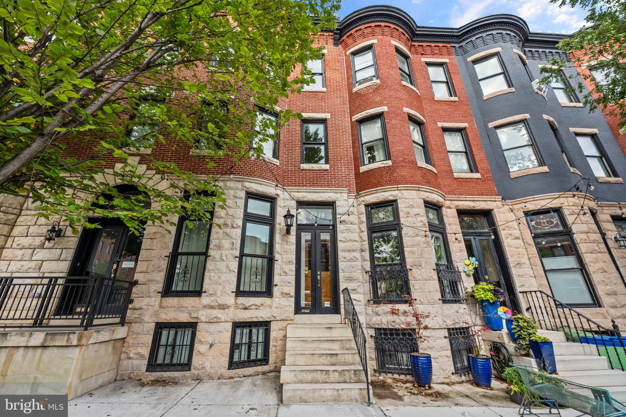 Discover a wonderful opportunity in Reservoir Hill: a gracious 4,300 sq ft Victorian rowhome where soaring proportions, original architectural detailing, and modern enhancements converge. With five bedrooms, three and a half bathrooms, and an expansive layout, this residence offers both grandeur and livability—designed for entertaining on a grand scale yet equally suited to the rhythms of everyday life.
Inside, natural light highlights bamboo flooring throughout, while exposed brick walls and restored wood trim add warmth and texture to the home’s elegant bones. Recent upgrades ensure peace of mind, including a new tankless water heater (under 2 years old), a replaced sewer line, fresh paint and floor touch-ups, a new dishwasher, and ongoing care that reflects meticulous stewardship. The result is a property that feels both timeless and turnkey. The floor plan accommodates today’s lifestyle with ample bedrooms, multiple baths, and generous living spaces.
Set along tree-lined streets and historic architecture, Reservoir Hill is one of Baltimore’s most distinctive neighborhoods. Anchored by Druid Hill Park—with its trails, conservatory, and lake—residents enjoy immediate access to green space while being moments from the vibrancy of downtown and cultural hubs like the Meyerhoff Symphony Hall and Station North Arts District. The community is known for its architectural legacy, active neighborhood association, and proximity to Penn Station for easy commuting to Washington, DC or New York. Living here offers the best of both worlds: the charm of a storied historic district and the convenience of modern city life.