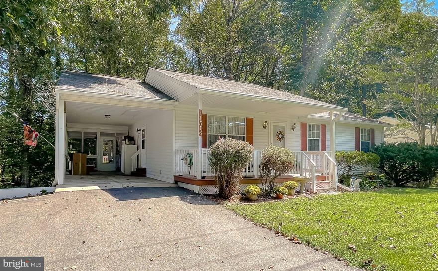 Come see this wonderful Large rambler with a finished basement on a nice size lot Close to the back gate and Post Office entrance. The home has 4 Bedrooms, and 3 full baths Large kitchen, a beautiful sunroom screened-in back porch, the owner's bath has soaking tub ceramic tile, and the basement has an extra bedroom/storage room and a full bath for generational family/in-law suite/guest room. Fenced-in back yard with one car carport and two parking spaces in front of it. Owners already have their home of choice and are move ready! Comes with a one-year Home Warranty through America's Preferred Home Warranty