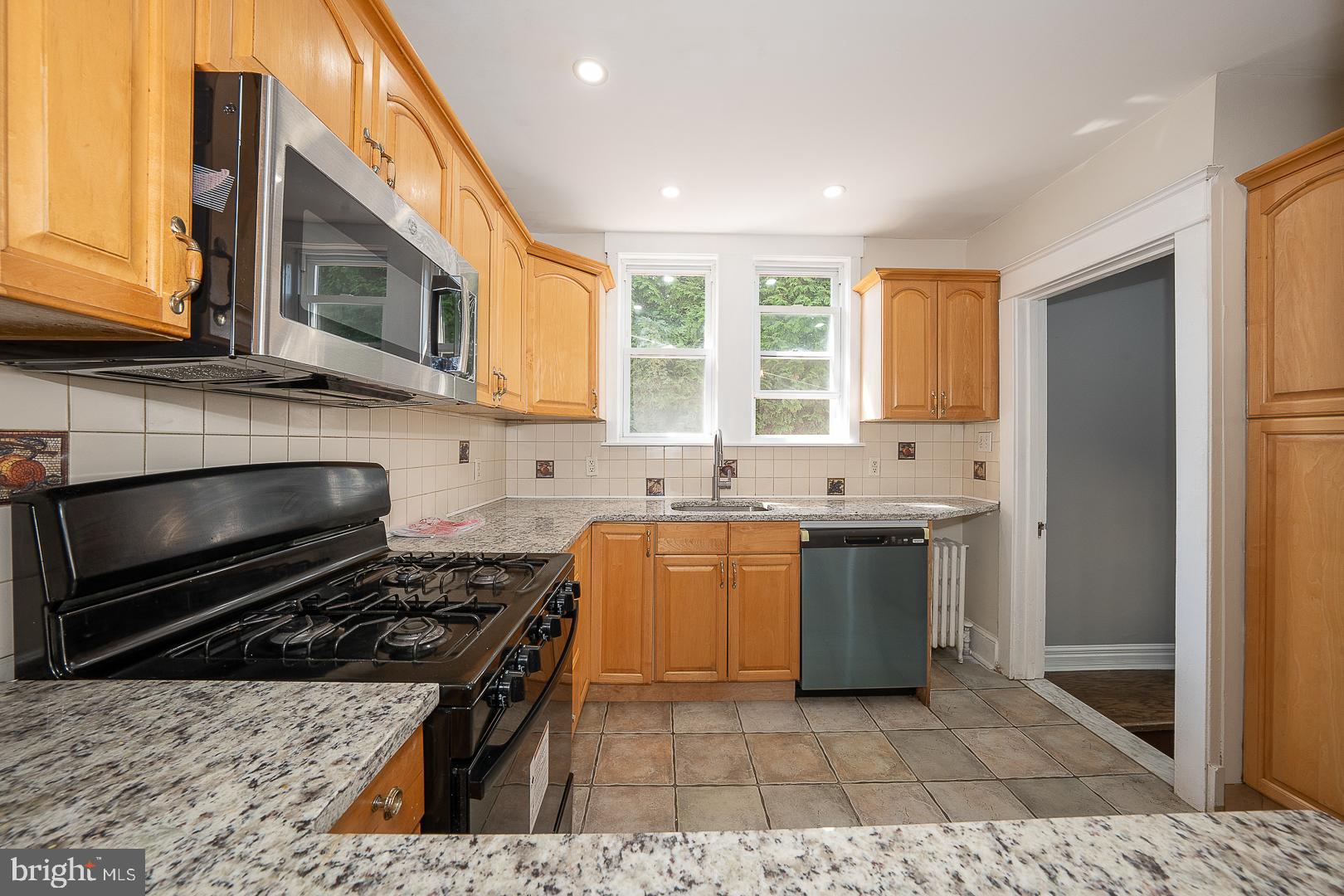 Welcome to this move-in ready twin home tucked away on a quiet street in Drexel Hill!
Offering approximately 1,600 finished square feet, this home features three well-sized bedrooms, two full bathrooms, and a finished loft that could serve as a spacious primary suite or home office. The fully finished basement adds even more versatility with its own bedroom, full bathroom featuring a magnificent shower, laundry area with washer/dryer, and built-in cabinets and sink—ideal for an in-law suite or guest retreat.
On the main level, enjoy a bright living space with newer vinyl flooring, a beautifully updated kitchen with brand-new granite countertops, a new refrigerator, microwave, and dishwasher, plus a dining area that flows seamlessly to the outdoors. Behind the home, relax on the great-sized deck surrounded by privacy landscaping, enjoy the nice yard, and take advantage of the large shed for all your storage needs.
Additional highlights include a freshly painted interior and a roof less than 10 years old with plenty of life remaining. Public transportation is just a few blocks away, with groceries, shopping, and restaurants all close at hand.
Not one inch of this home is wasted—this gem is a must-see and won’t last long!