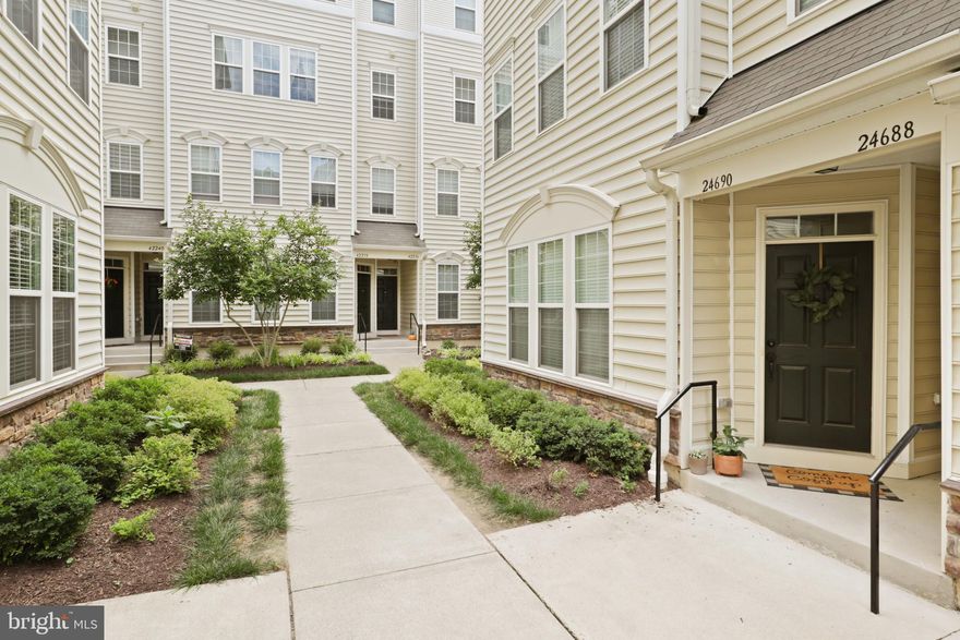 Welcome to your new home in the highly desirable Mercer Park! This newer 2-level condo (top floors) has 3-4 bedrooms, 2.5 baths, and a generous 2,612 sq ft of living space.
Sun-filled condo with an open floor plan! The gourmet kitchen has granite countertops, sleek dark cabinets, a pantry and boasts a large center island with a breakfast bar and stainless steel appliances, including a GAS stove.
Entertain guests on the main level with a large dining area with doors opening to the balcony. Additionally, the main level offers a half bath and an extra living space that can be utilized as a den, home office, or 4th bedroom!
Upstairs, you'll find the primary bedroom suite, featuring a spacious walk-in closet and an en-suite bathroom equipped with a dual sink vanity, a soaking tub, and a separate shower. Two more well-appointed bedrooms and a stylish hall bath with a dual sink vanity and a tub/shower combo round out the upper level, along with the convenience of a full-size LG washer and dryer on the bedroom level.
Parking is easy with the attached one-car garage, reserved parking space #86 and visitor parking. The community amenities  include a gym, pool, tennis courts, walking trails, basketball courts, and tot lots. Plus, you'll enjoy the stunning Byrne Ridge County Park situated right in the heart of the community.
Conveniently located near a variety of shopping and dining destinations, Dulles (IAD) Airport, and major commuter routes such as Rt. 50, Rt. 28, and Rt. 66, this property provides unmatched accessibility. LOW condo fees cover water, trash, sewer, exterior building maintenance, and lawn care, providing you with hassle-free living at its finest.