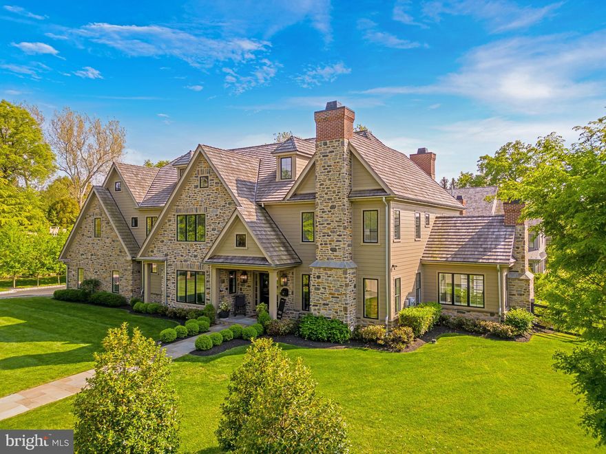 Old World elegance meets distinctive modern design in this remarkable custom home timelessly crafted by Blake Development, one of Philadelphia's premier homebuilders. Located in Chestnut Hill, one of the area's most sought after neighborhoods, the beautifully landscaped property is on a rarely traveled side street just steps from the dining and shopping along Germantown Avenue, the train and the Wissahickon Trails of Fairmount Park. A distinguished design offers impeccable scale and amenities enhanced by stylish luxury selections evident throughout the home.