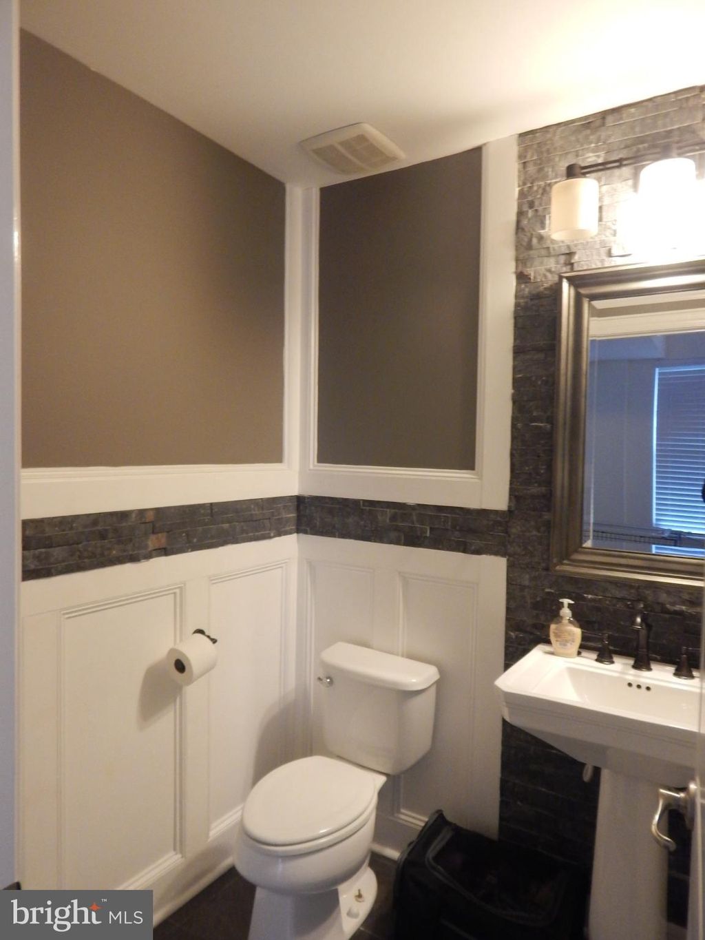 Photo of 709 S Macon Street, BALTIMORE, MD 21224 (MLS # MDBA2197554)