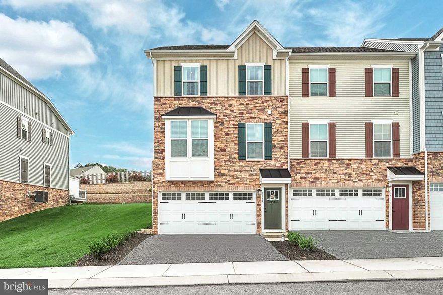 Welcome to the gated golf course and fine dining community of Regent's Glen! This very desirable end unit townhome boasts 3 bedrooms, 2-1/2 bathrooms and a finished basement for possible 4th bedroom, office, etc. and is accessible from inside the home or straight through the 2-car garage at ground level.  The chef's kitchen features upscale Espresso cabinetry, stainless appliances, granite countertops, a pantry and a huge island that can seat five comfortably. The bright floorplan allows for open concept versatility with rooms flowing from kitchen to dining area to the large living room with half bath. Walk out onto the expansive Trex deck through the sliding doors and just unwind and escape for a while in your private oasis. Upstairs, the primary bedroom features a large walk-in closet and adjoining en suite with double sinks and lots of storage. Ample sized bedrooms, laundry on the 2nd floor, another full hallway bathroom and a full attic are just a few more of the many amenities. Neutral luxury vinyl plank flooring and carpeting throughout. All appliances including Refrigerator, Stove, Dishwasher, Microwave, Washer and Dryer are all included.  The roof, HVAC system, whole house humidifier, tankless hot water system and all other components of the home are LESS THAN 4 YEARS OLD! Low maintenance, easy-breezy living ... just bring your bags and move right in!  There are additional amenities that can be purchased in the community in addition to what is included in the standard HOA. **GOLF MEMBERSHIP-Golf members will have full access to the fantastic Arthur Hills designed golf course, full access to the driving range and short game area, full access to the pool, and fitness center. Full access to member only dining at The Fairway Table. ** SOCIAL MEMBERSHIP -Social members have full access to exclusive member only dining at The Fairway Table, the pool, fitness center and six rounds of golf per year (Cart & Guest Fees apply), and full access to driving range and short game area. For more information on Regent's Glen offerings visit Regent's Glen Website.
