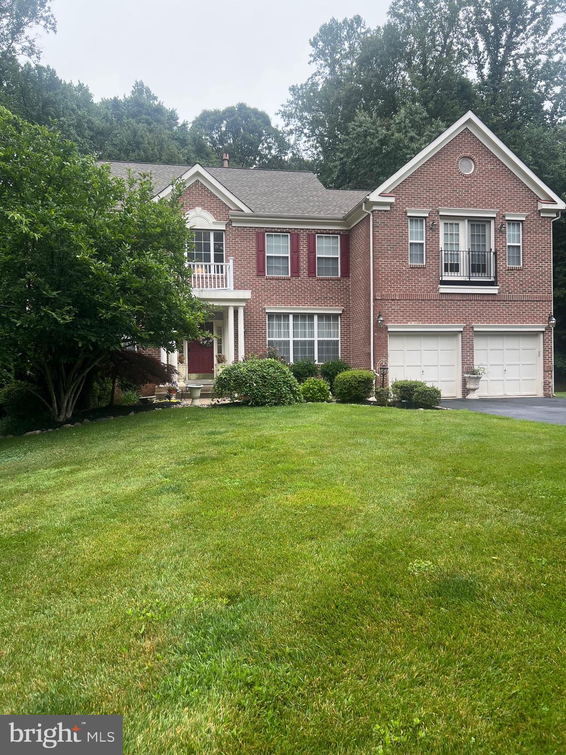 More then just curb appeal! This gorgeous home sits on 2.25 acres. Brick -front colonial offering 5-bedrooms and 3.5 bathrooms. The foyer balcony overlooks the 2-story foyer. High ceilings throughout main level in which you will find an elegant finished level that includes a main-level den/study, formal living and dining room that seamlessly flow into the gourmet kitchen that will be great for entertaining and an inviting family room that includes a cozy gas log fireplace. Stone flooring and island with granite tops in the kitchen. Beautiful screened porch off of the kitchen and 2 additional decks on the top level and a brick patio on the bottom level. The upstairs includes 2 master bedrooms with sitting rooms in each and a fireplace. Very scenic and beautiful front and back yards that back to forestry. Professional landscaping that includes underground sprinkling system. This is an absolutely a beautiful home. You do not want to miss it in this sought after neighborhood.