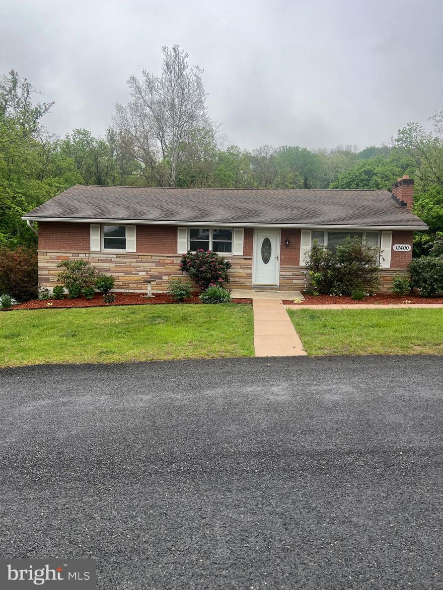 Dont miss this beauty!! 
This 3 bedroom well-loved home is nestled in the desirable comfortable community of LaVale.  With plenty of quiet yard and a peaceful stream.  The large deck off the kitchen and dining room overlook the mature trees and quiet backyard, a great spot for morning coffee or a dinner with friends.  The well lit modern kitchen/ dining room makes for enjoyable meal times.  Main floor bathroom and newly painted bedrooms make for easy access and the new laminate flooring make cleaning a breeze!!
Shopping, restaurants and highway access make this a very desirable home and property