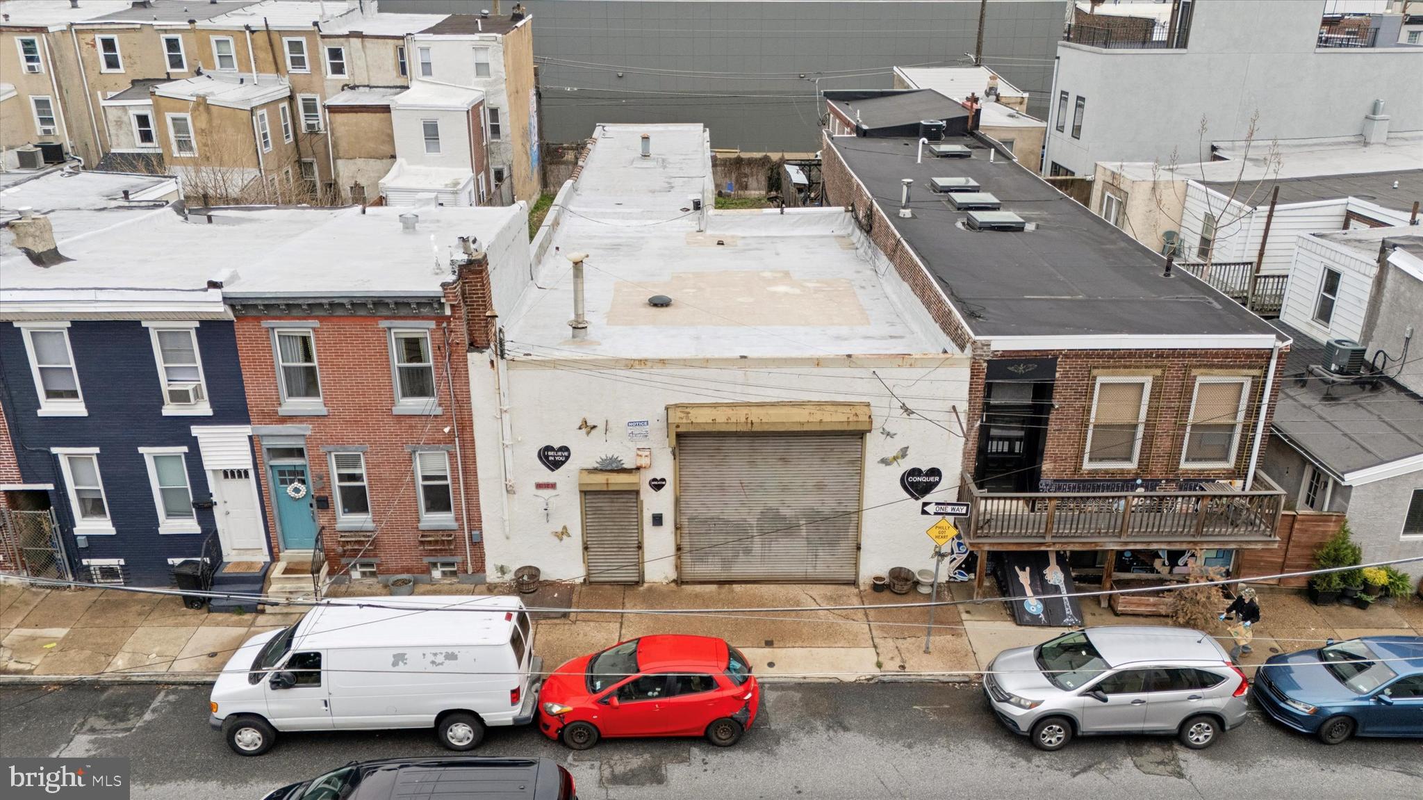 *Development Opportunity!*
2181-83 Hazzard St, located in the heart of Fishtown development is currently a warehouse-style building that extends from Hazzard St. to Huntingdon St. and has two curb cuts, one in the front, and one in the back. The building boasts over 2000 square feet of space. The entire property is fenced and consists of four parcels, all being sold together. The complete addresses are 2181-83 E Hazzard St. and 2186-90 E Huntingdon St.
With all the new construction around the possibilities are endless! Keep as a warehouse, or use for parking several cars, equipment, etc. This is perfect storage space. Or, choose to tear down the existing structure and build 5-6 Residential homes. There are so many possibilities! Don't miss out on this opportunity and schedule a tour today!