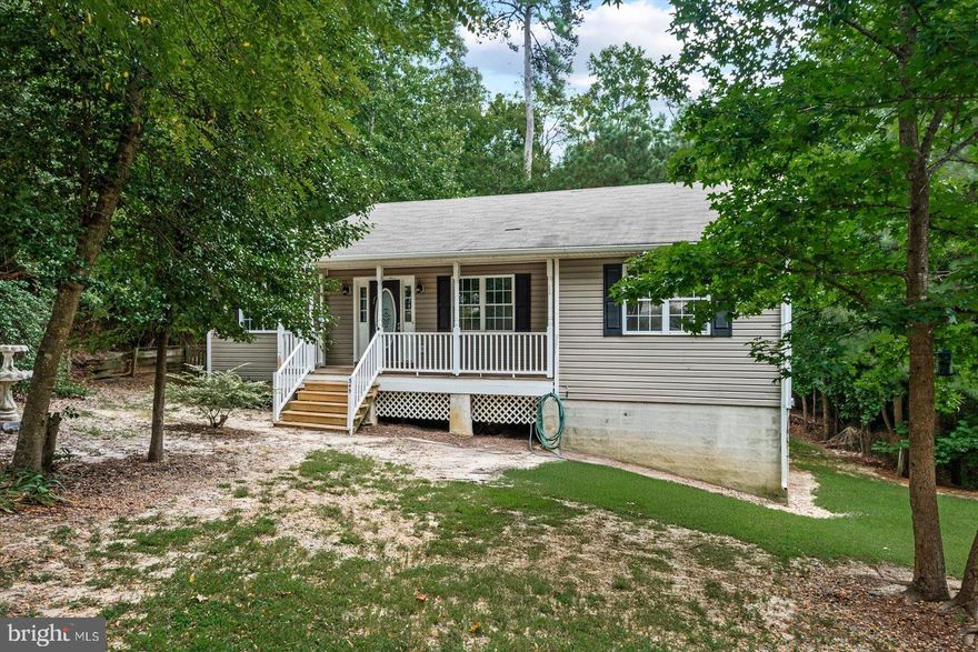 Welcome to your dream getaway in Stratford Hall, Montross! This stunning three-bedroom, two bath home boasts an inviting open layout that’s perfect for both relaxation and entertaining. Step into the living area and admire the soaring vaulted ceilings and a gorgeous stone fireplace that creates a cozy ambiance for any occasion.

The primary suite is a true retreat, featuring its own private bathroom, a spacious closet, and a bonus room that can easily serve as an office or personal oasis — the choice is yours! 

Don’t forget about the full walkout basement, just waiting for your personal touch to transform it into your dream space. Whether you envision a game room, gym, or additional living area, the possibilities are endless!

Enjoy your morning coffee or unwind at sunset from the charming front porch that overlooks your half-acre lot. This home is not just a place to live; it's a lifestyle waiting for you to make it your own! Don't miss out on this fantastic opportunity!