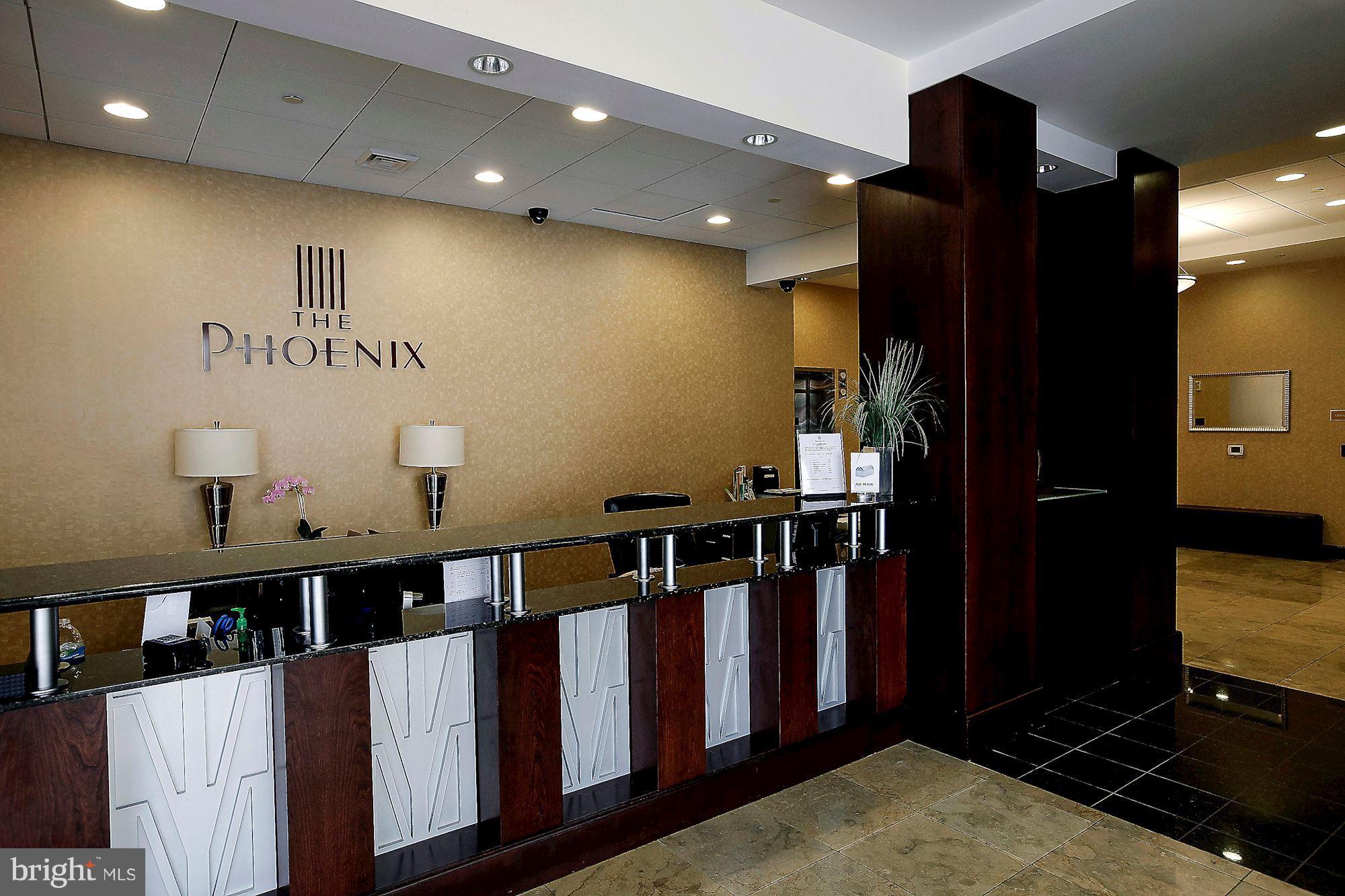 THE PHOENIX CONDOMINIUMS - Residential Lease