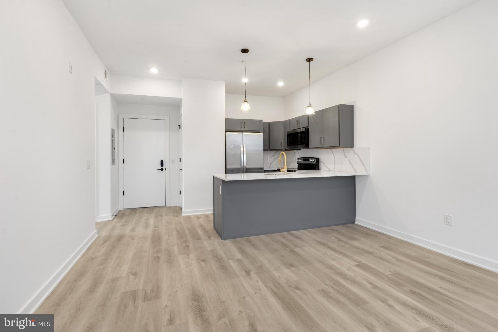 Available Early August | Leasing Special: 1 month free for a 13 month lease - $1,725/month gross rent, $1,592/month net effective rent.
Welcome to Penn Reading! This gorgeous, professionally managed building is the perfect place for you to call home! Modern features collide with convenient living in these spacious 1 and 2 bedroom apartments, located in vibrant East Kensington. You’re sure to love the luxurious lobby showcasing an elevator and 2 separate stairwells for easy and secure access in and out of the building. An Amazon Digital Key Delivery Access ensures your packages will be delivered inside the building for added peace of mind. Unit #3D is a 2 bedroom, 1 bathroom apartment on the 3rd Floor with ample closet space and great natural light. Conveniently equipped with central a/c for year-round comfort and in-unit laundry, each unit was custom engineered to offer peace of mind and well-being. The open floor plans provide a bright and airy atmosphere and ample room for you to customize your furniture arrangement. Enjoy kitchens that have never been used before and are fully equipped with cabinetry above and below, marble counters and backsplash, and sleek stainless steel appliances. Large windows offer abundant sunlight throughout and the bedrooms are sizable with sliding closet doors. The elegant bathrooms boast modern fixtures and lighted vanities with storage space. This beautiful rental won’t last long – call today to claim this gem as your own! Please note: photos & video tour are from a similar unit within the building; exact layouts and finishes may vary.
Lease Terms:
Generally, 1st month, 12th month, and 1 month security deposit due at, or prior to, lease signing. Other terms may be required by Landlord. $55 application fee per applicant. Pets are conditional on owner's approval and may require an additional fee, if accepted. (Generally, $500/dog and $250/cat). Tenants responsible for: electricity, cable/internet, and $55 /month flat water fee. Landlord Requirements: Applicants to make 3x the monthly rent in verifiable net income, credit history to be considered (i.e. no active collections), no evictions within the past 4 years, and must have a verifiable rental history with on-time rental payments. Exceptions to this criteria may exist under the law and will be considered.