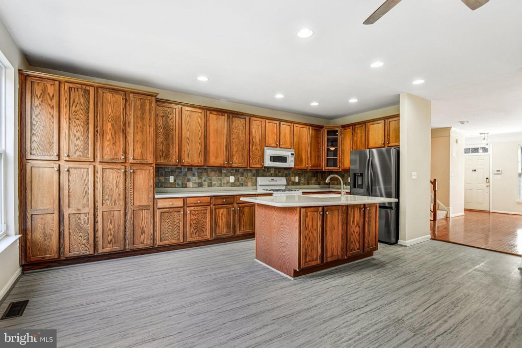 Photo of 9073 Ribbon Falls Loop, BRISTOW, VA 20136 (MLS # VAPW2106444)