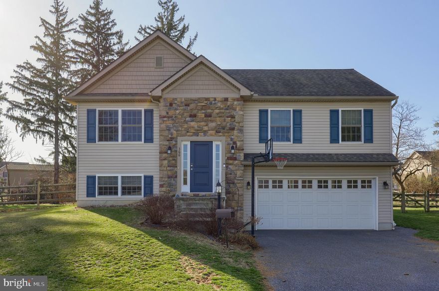 Welcome to this charming 3 bedroom, 2.5 bath home, perfectly nestled at the end of a quiet street. This well-maintained bi-level offers a warm and inviting layout, ideal for both relaxing and entertaining. Upstairs, you'll find a bright living room that flows seamlessly into the dining area and kitchen, along with three comfortably sized bedrooms including a primary suite with its own private bath. The lower level features a cozy family room, a convenient half bath, laundry area, and access to the attached garage.  A 220 volt outlet is installed in the garage providing convenient charging for electric vehicles.  Step outside to a spacious, fully fenced backyard retreat—perfect for pets, play, gardening, gatherings, or simply unwinding in peace.  Enjoy a large deck for entertaining, a relaxing hot tub, and family-friendly features including a playhouse and swing set. 
 With minimal traffic and a serene setting, this home blends comfort, functionality, and privacy in a location you’ll love.