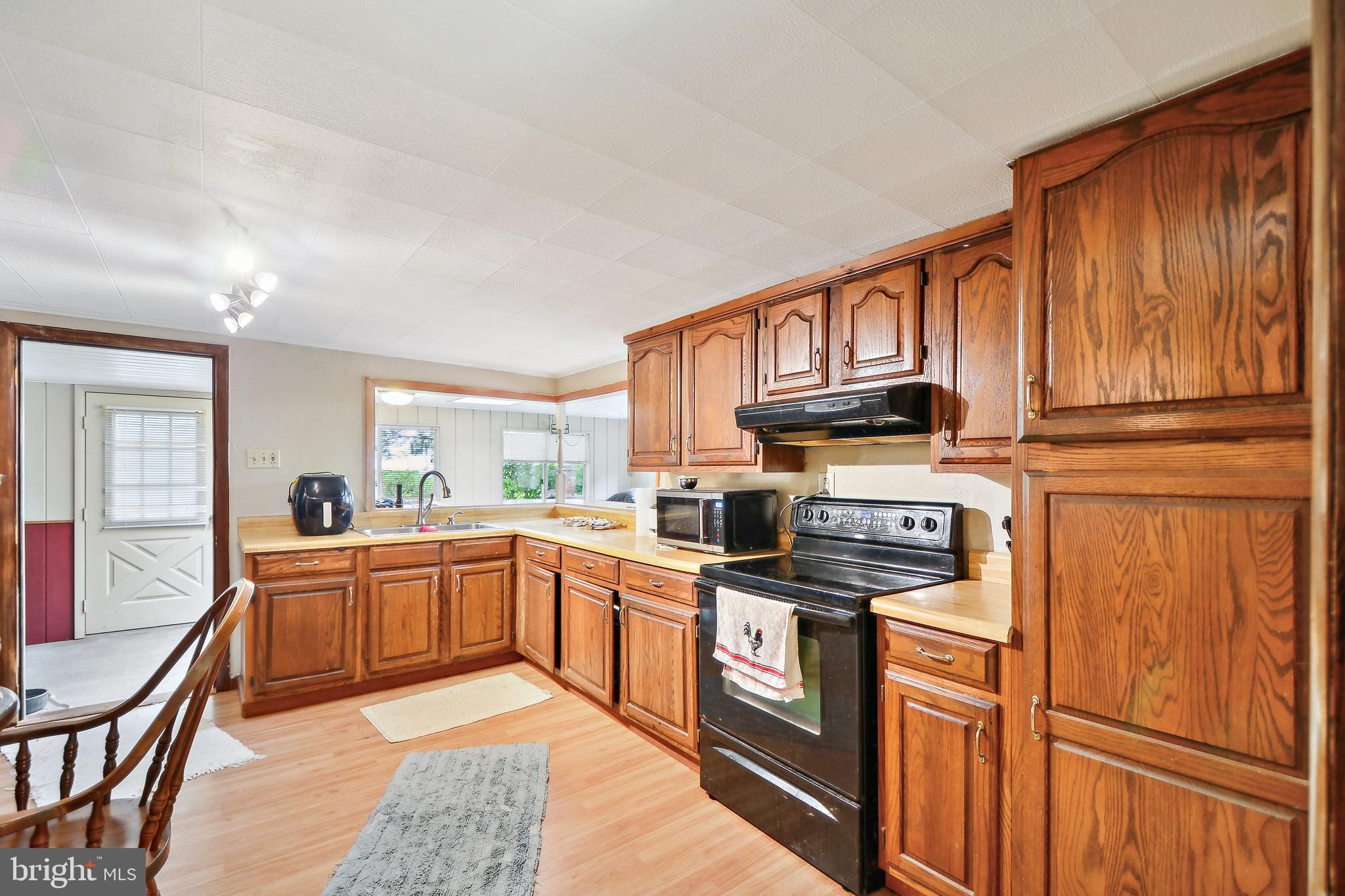 Discover the Possibilities in the Heart of the Poconos!
Unleash your vision with this charming fixer-upper in a prime Pocono location—ideal for savvy investors, creative flippers, or homeowners ready to craft their dream retreat. Zoned C-3 short-term rental friendly, this 3-bedroom, 1-bath single-family rambler offers incredible potential for value-adding renovations.
Included in the sale is an adjacent vacant lot (Parcel ID 03.11.1.104), opening the door to endless expansion or investment opportunities—build, garden, or simply enjoy the extra space.
Inside, you’ll find a spacious eat-in kitchen, cozy living room, dedicated laundry room, and a detached two-car garage—ready to be reimagined into the perfect mountain getaway.
Just 5 minutes from serene Tobyhanna Lake and Tobyhanna State Park, and only 15 minutes from the thrills of Kalahari Waterpark, this location offers the best of nature and entertainment. Enjoy nearby dining, shopping, and all the adventure the beautiful Pocono Mountains have to offer.
This is more than a property—it’s a canvas for your vision. Don’t miss this rare opportunity to create something truly special.