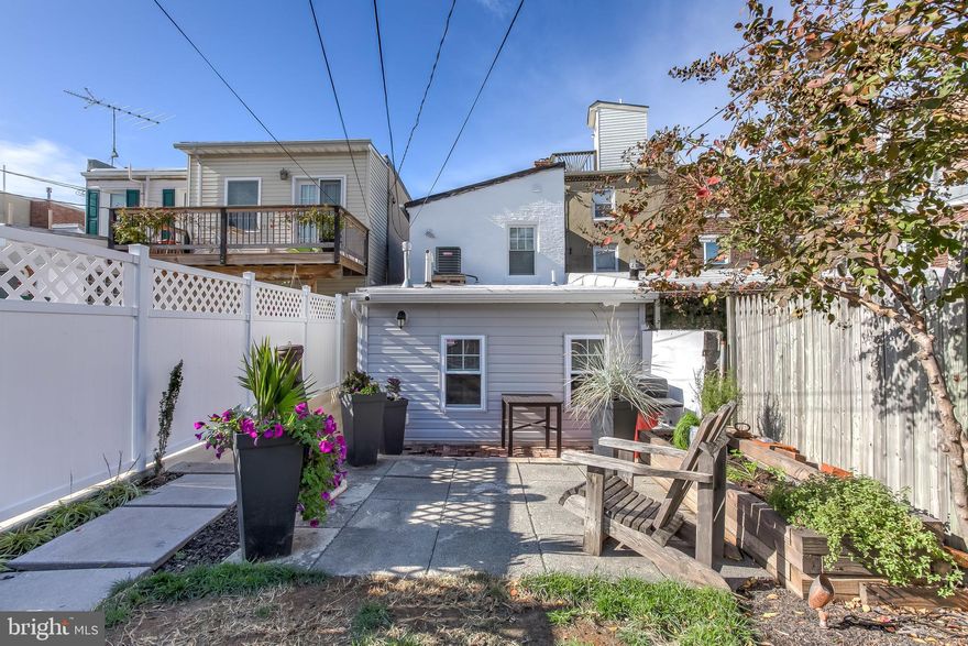 TWO CAR PARKING AND A YARD in the city!!! Check out this beautifully renovated DETACHED row-home in the heart of South Baltimore. Just steps away from all Federal Hill and Riverside have to offer. Plus, a short walk to Riverside Park! Completely renovated less than 5 years ago. Beautiful hardwood floors throughout. Tastefully renovated and modern kitchen with quartz counter tops and stainless steel appliances. Spacious dining room with custom built ins. A bonus... main level half bath. Private fenced in backyard with a storage shed and easy side by side 2 car parking. A rare gem, all for under $300K, this home will go quickly!